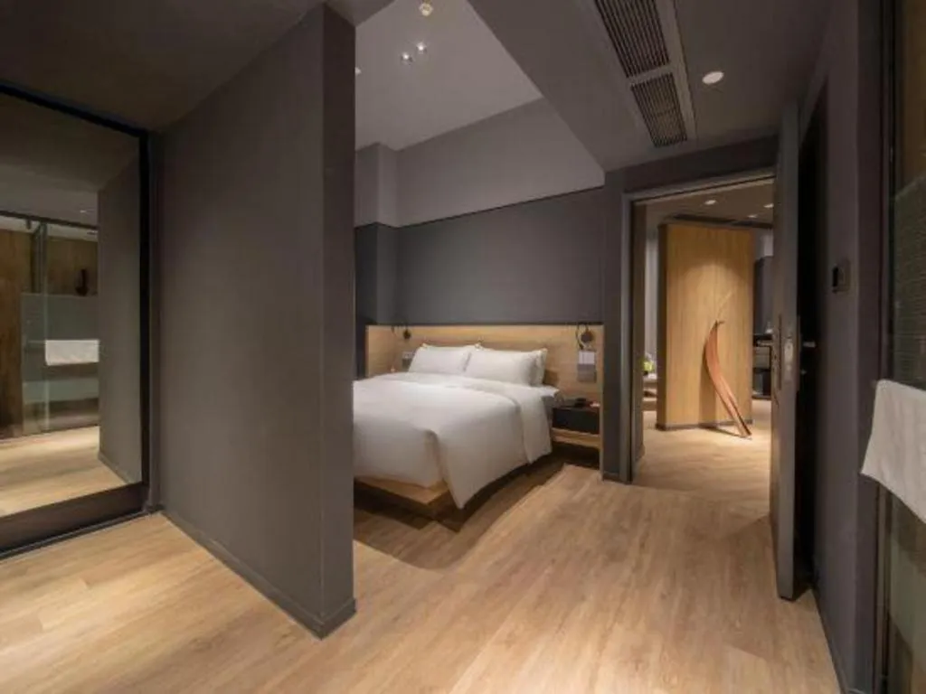 Bed in Opus Hotel Jiangmen