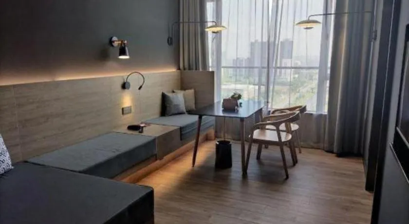 Bed in Opus Hotel Jiangmen