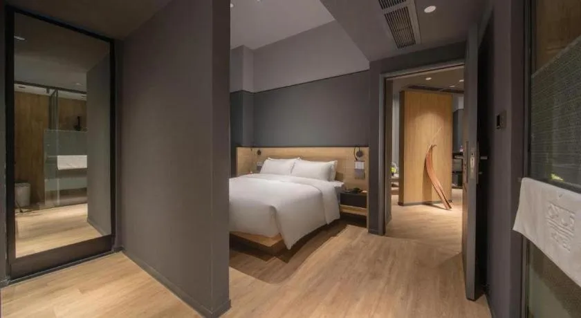 Bed in Opus Hotel Jiangmen