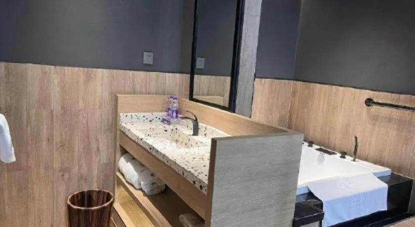 Bed in Opus Hotel Jiangmen