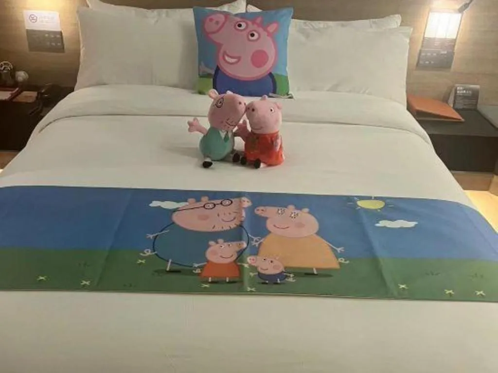 Bed in Opus Hotel Jiangmen