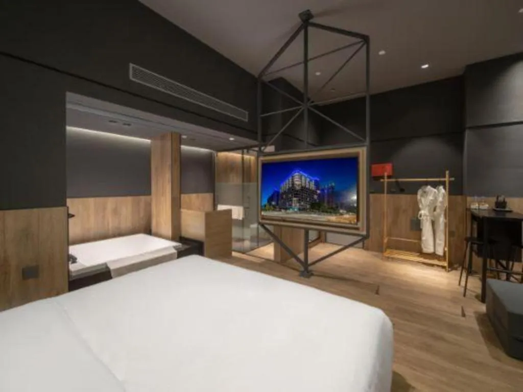 Bed in Opus Hotel Jiangmen