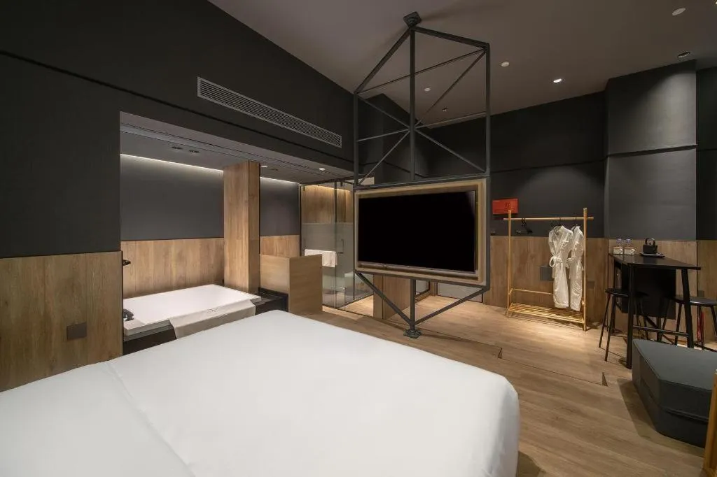 Bed in Opus Hotel Jiangmen