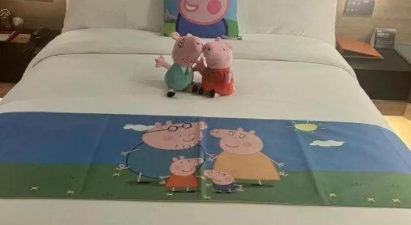 Bed in Opus Hotel Jiangmen