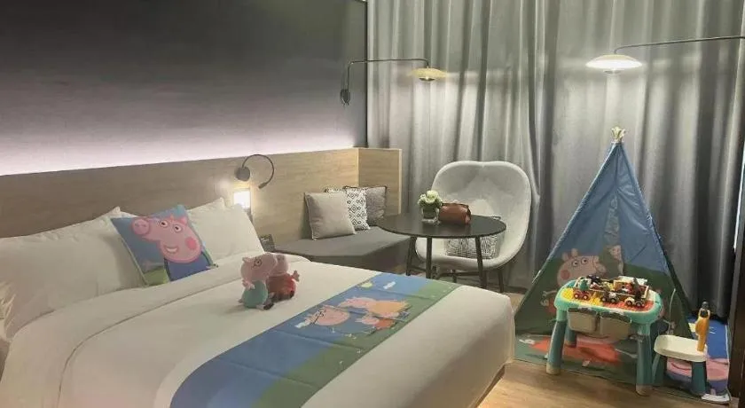 Bed in Opus Hotel Jiangmen