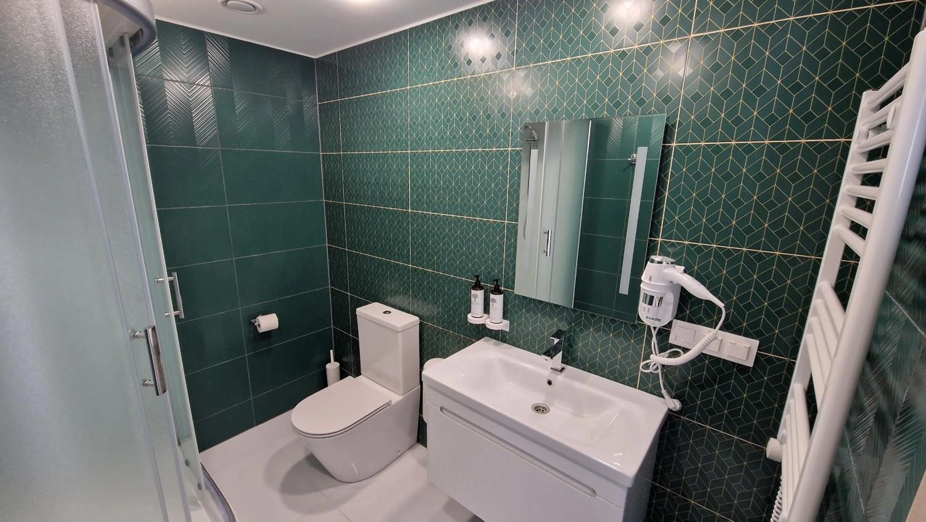 Toilet in Suncity Hotel & SPA