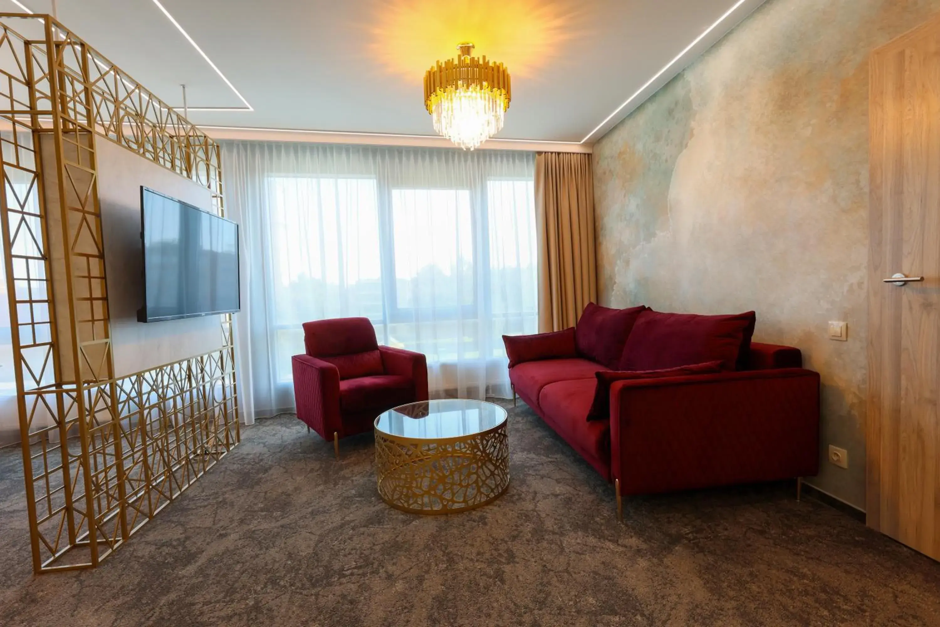 Living room in Suncity Hotel & SPA Living room in Suncity Hotel & SPA