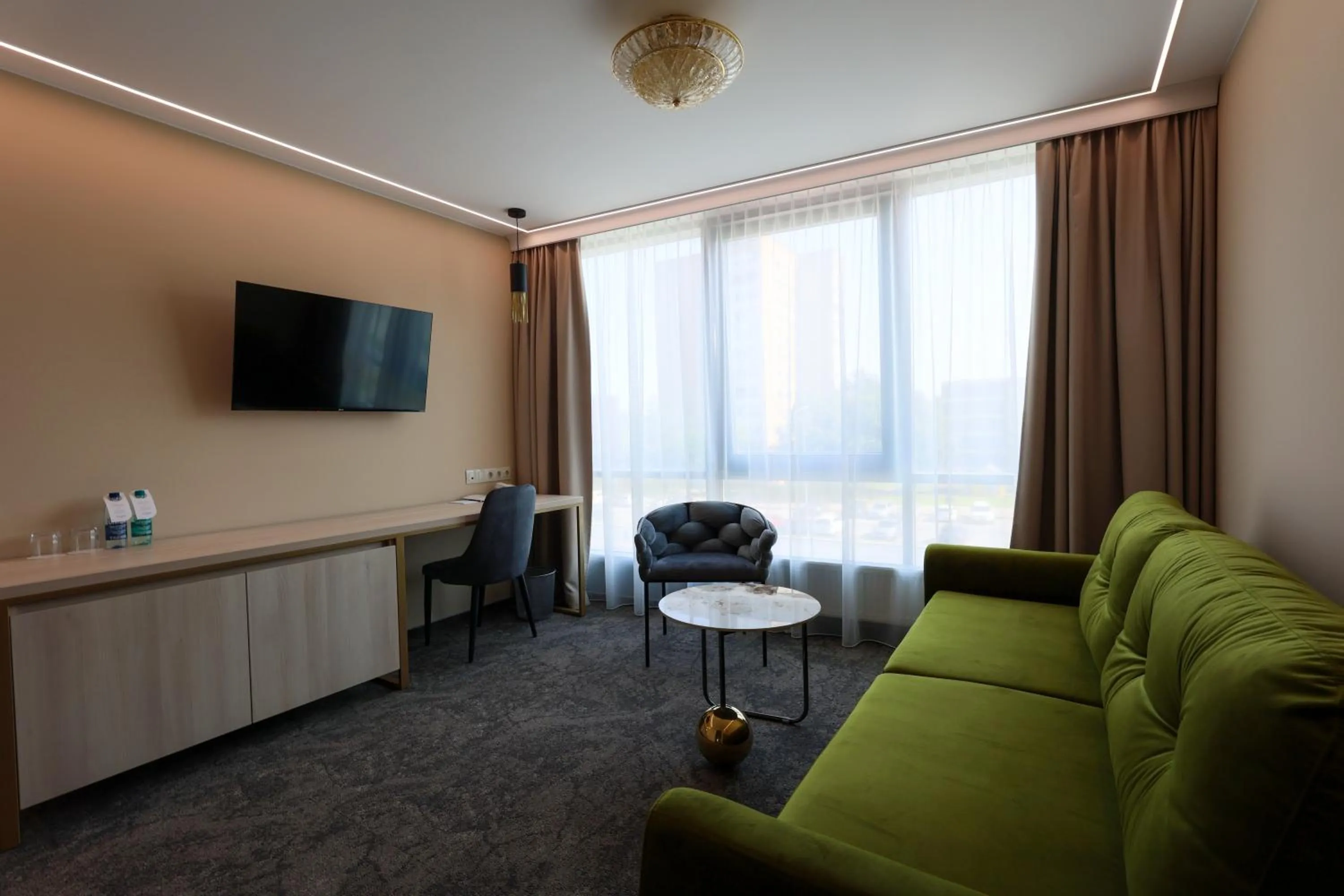 Living room in Suncity Hotel & SPA