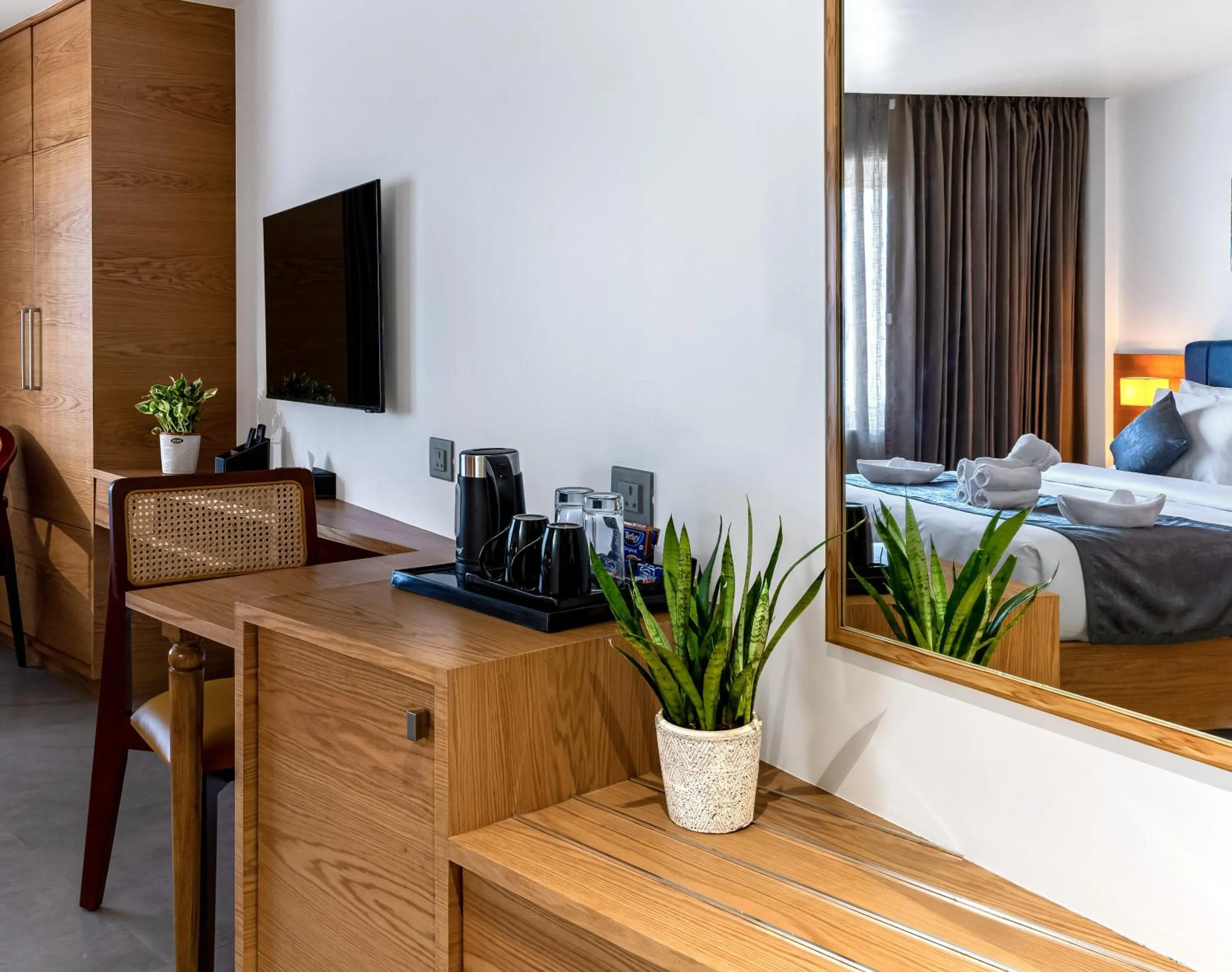 TV and multimedia, Bed in ESPERO INN Malappuram