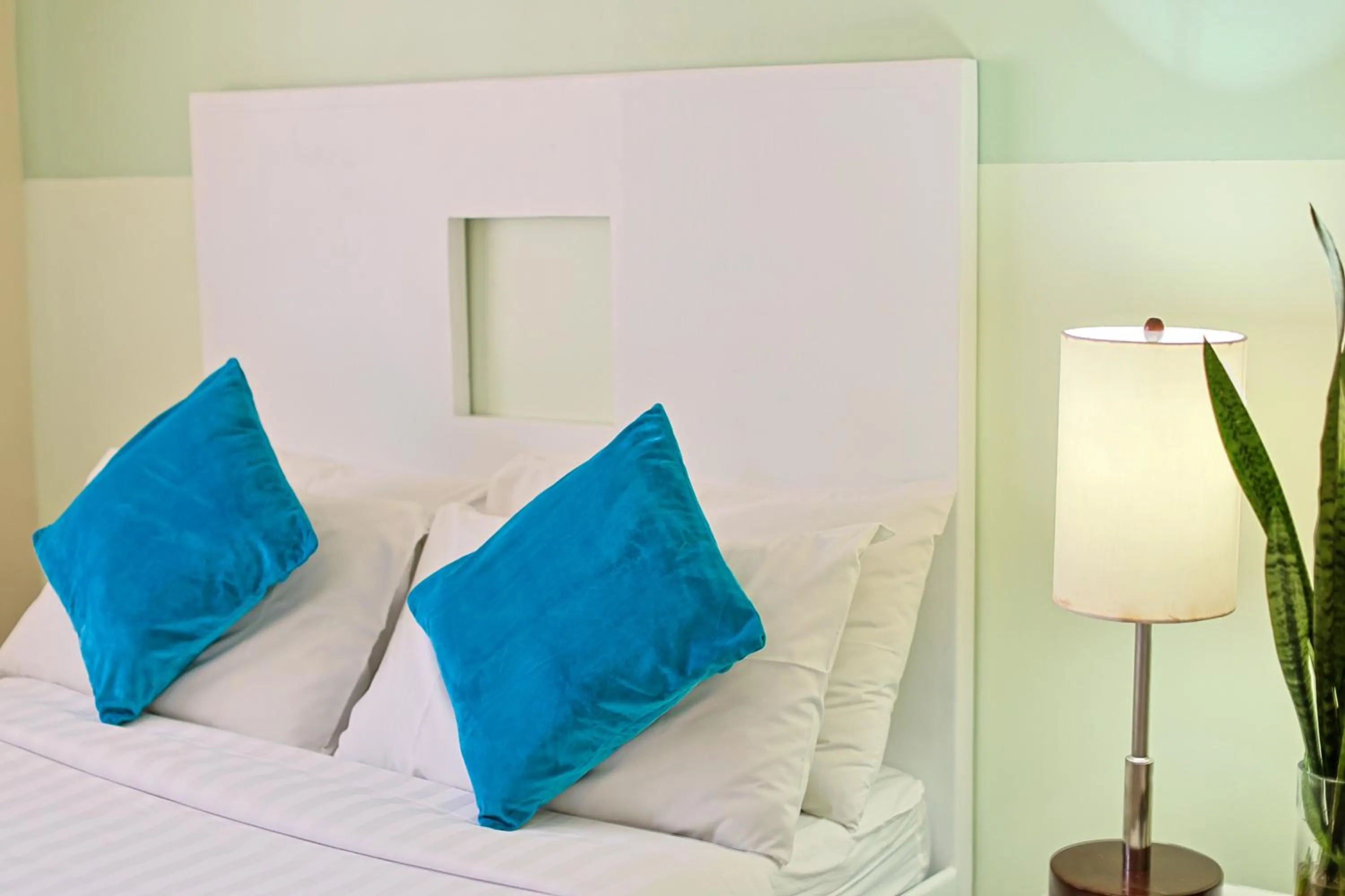 Bedroom, Bed in Holiday Suites Business District - formerly Empire Suites Hotel