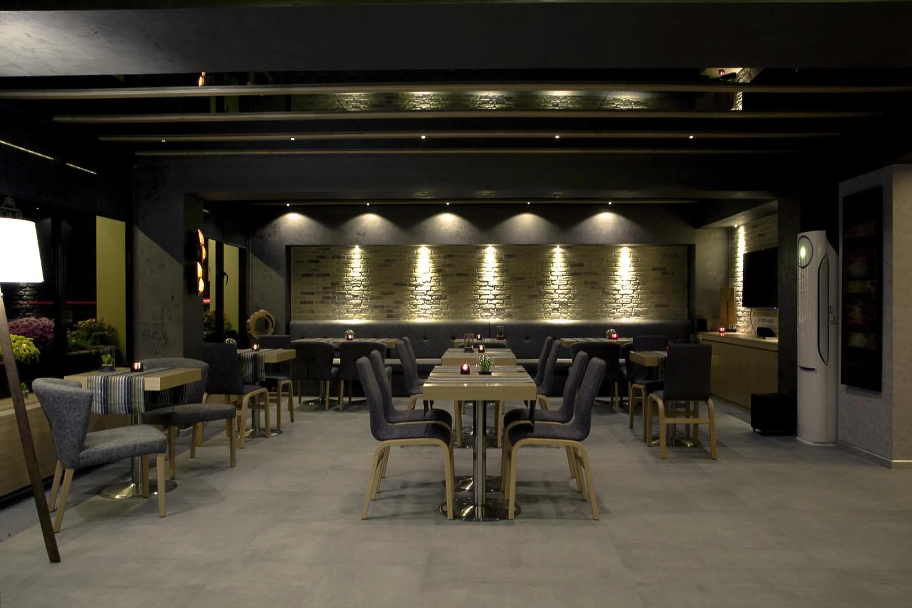 Communal lounge/ TV room in The Black Hotel