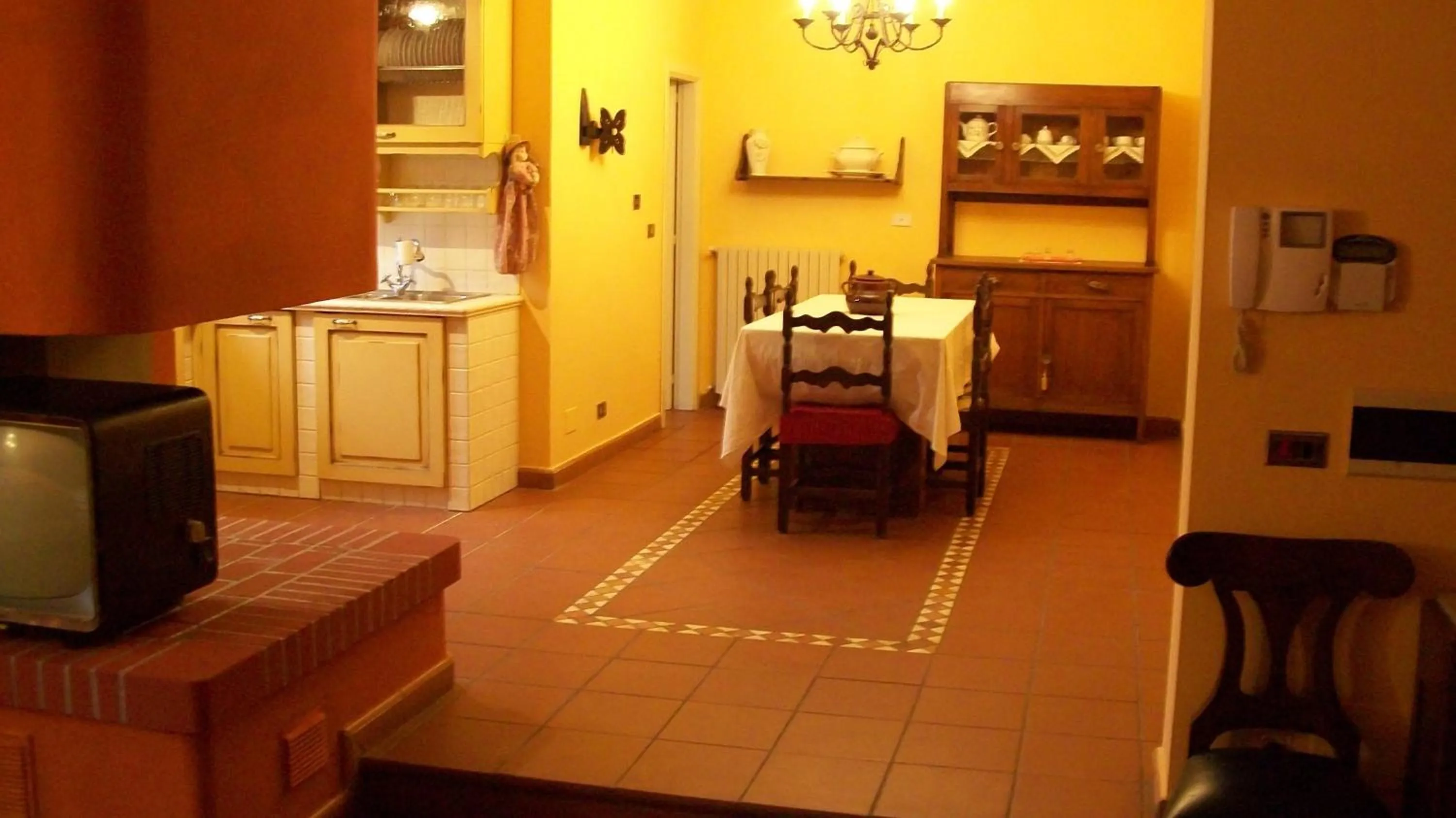 Communal lounge/ TV room in Villa Sargiano