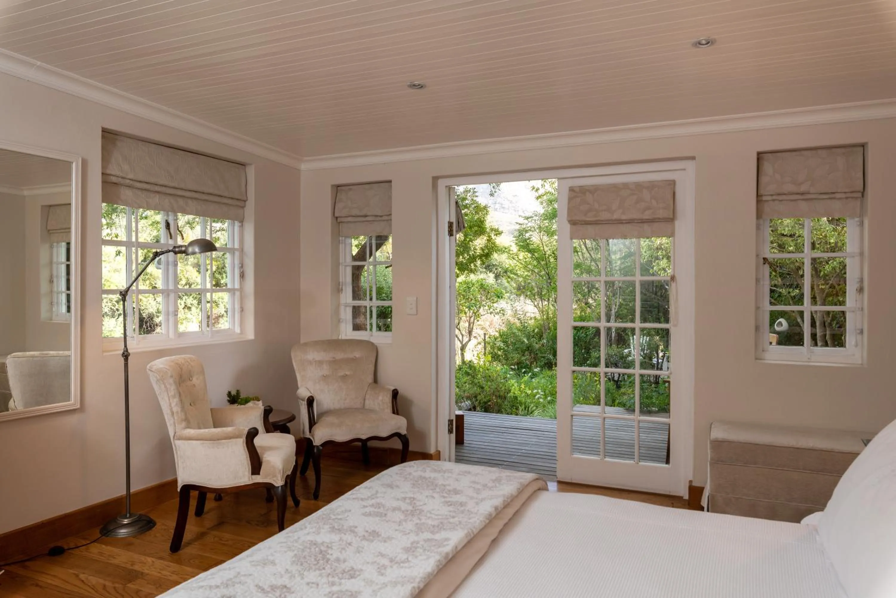 Seating area, Bed in In Abundance Guest House