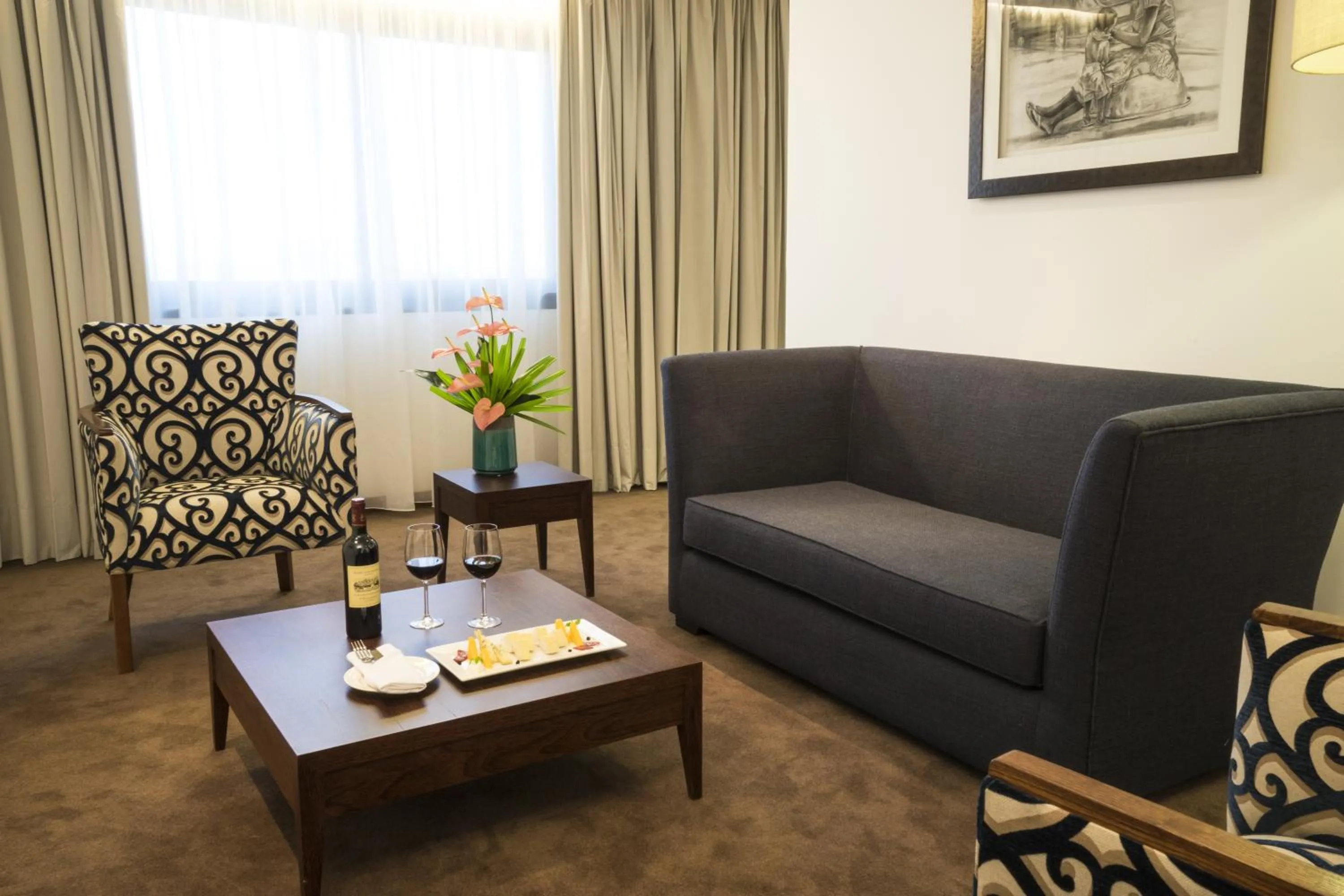 Seating area in Fiesta Residences Boutique Hotel and Serviced Apartments.