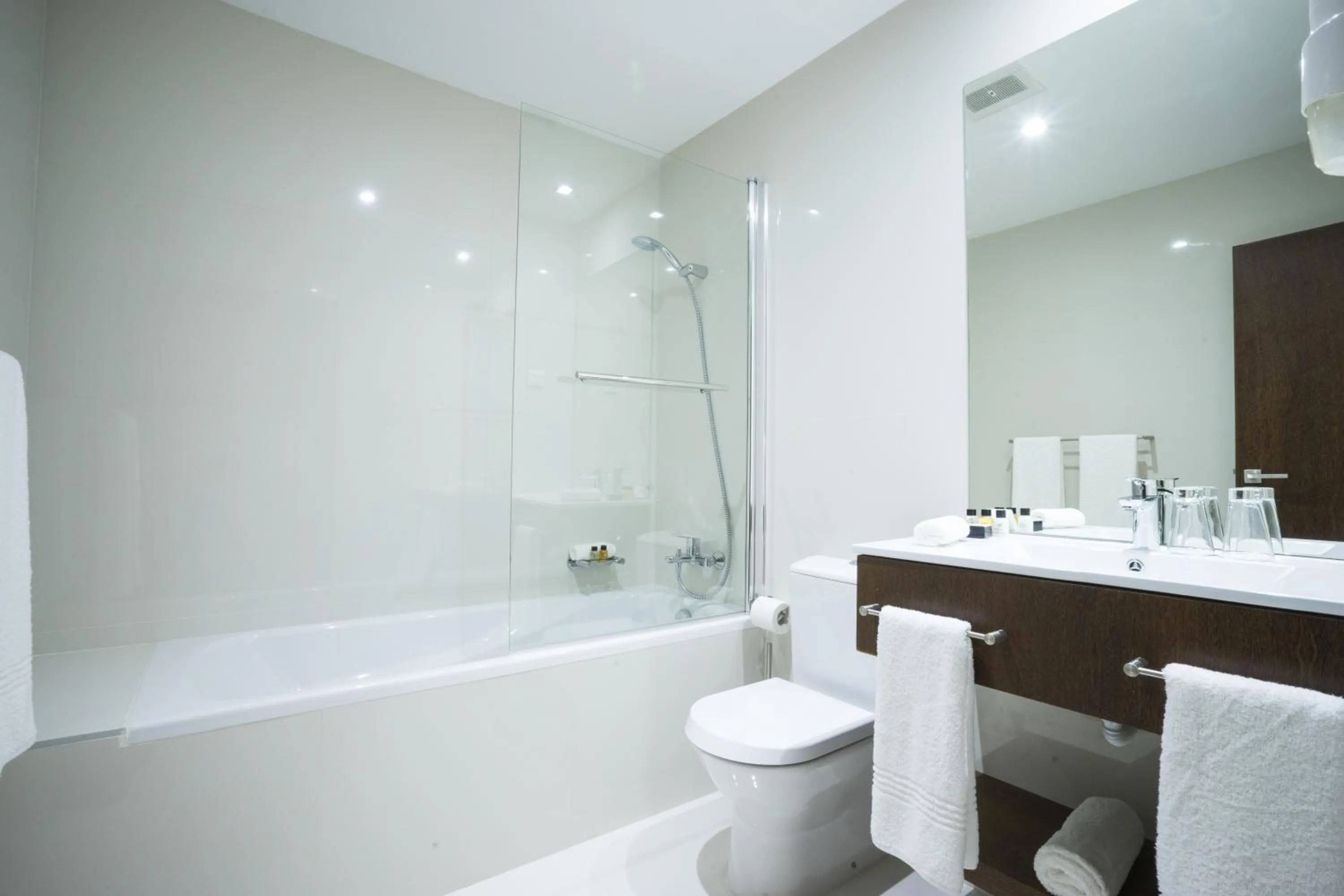 Shower in Fiesta Residences Boutique Hotel and Serviced Apartments.