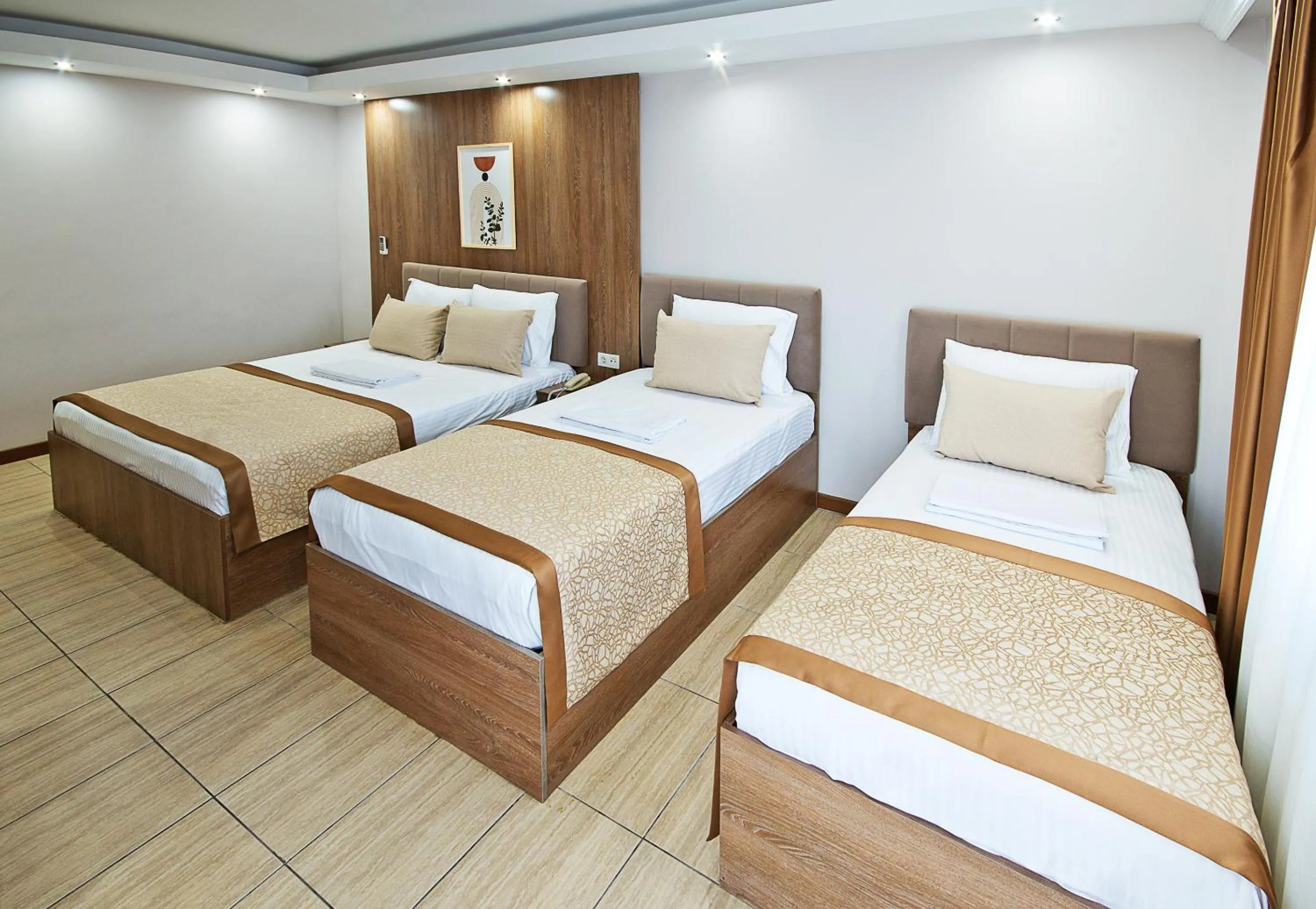 Bed in Lion City Hotel