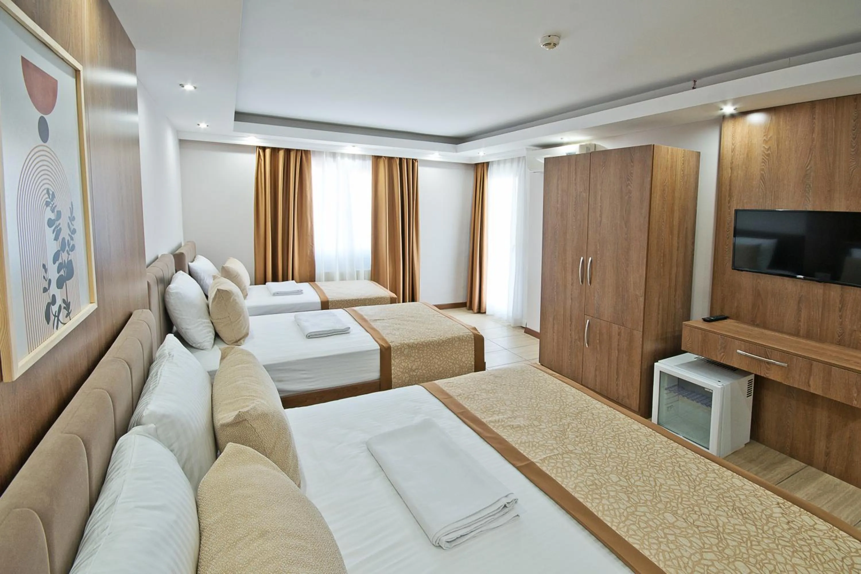 Bed in Lion City Hotel