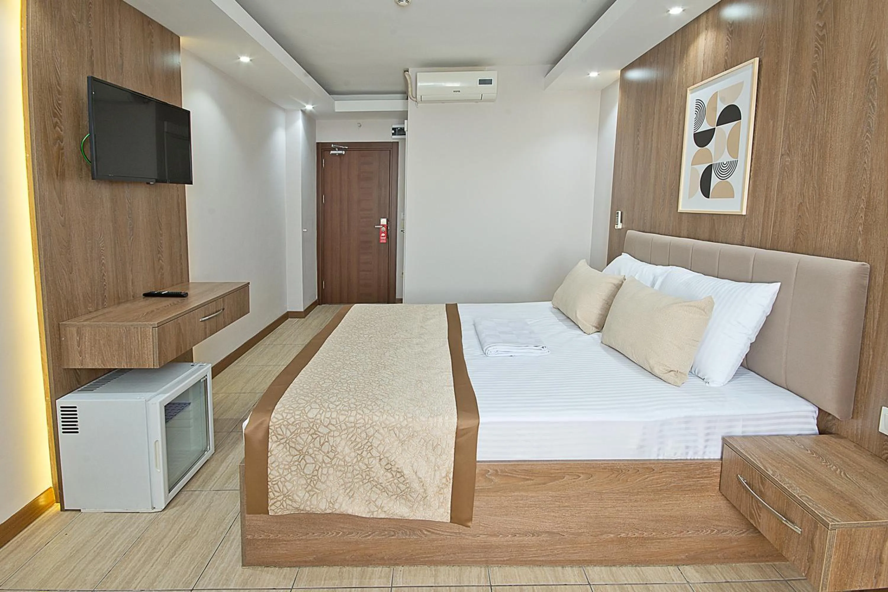 Bed in Lion City Hotel