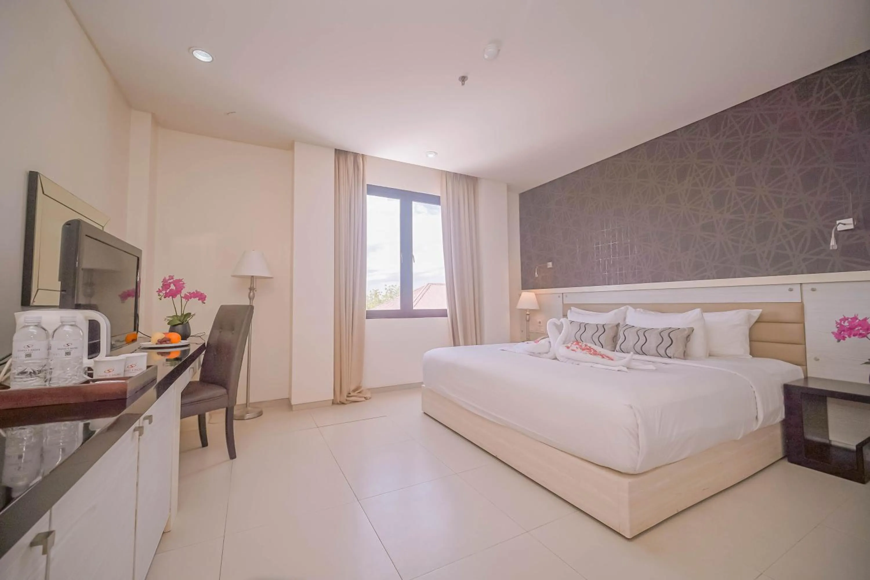 Bed in Sahid T-More Hotel