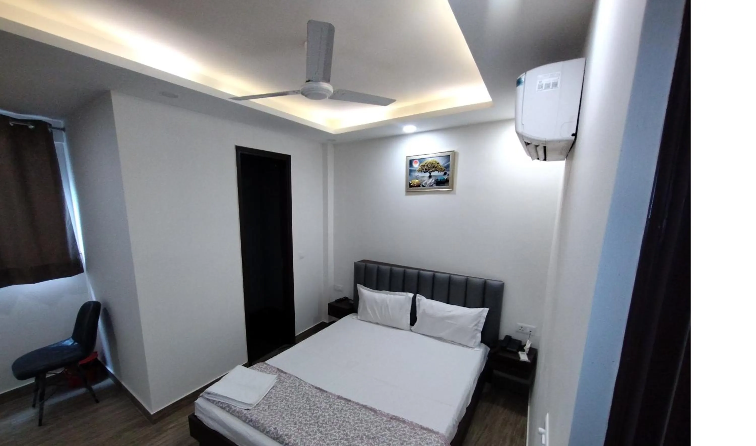 Toilet, Bed in Hotel Sunrise Ecostay