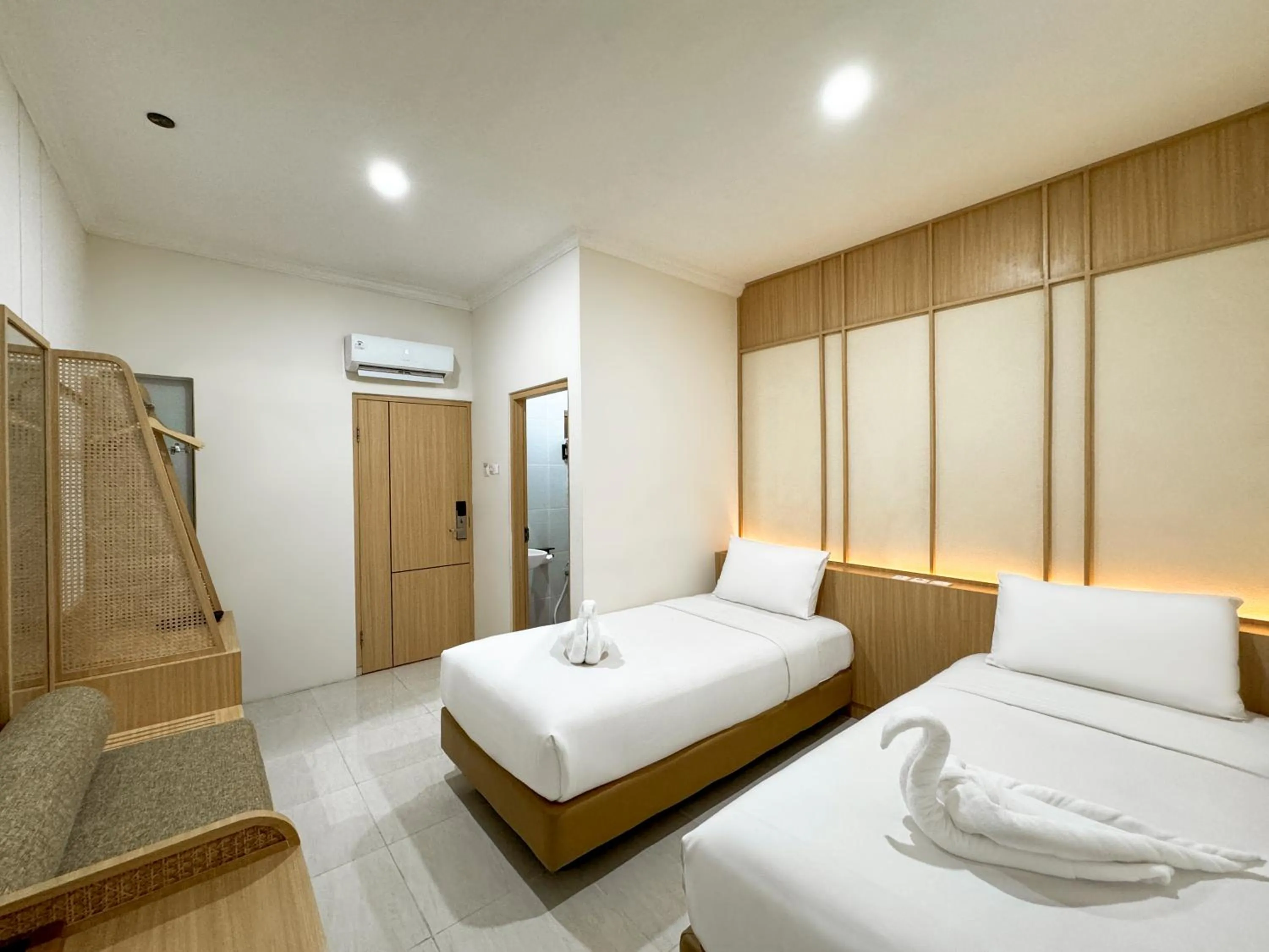 Bed in Masri Living by Daphna Management