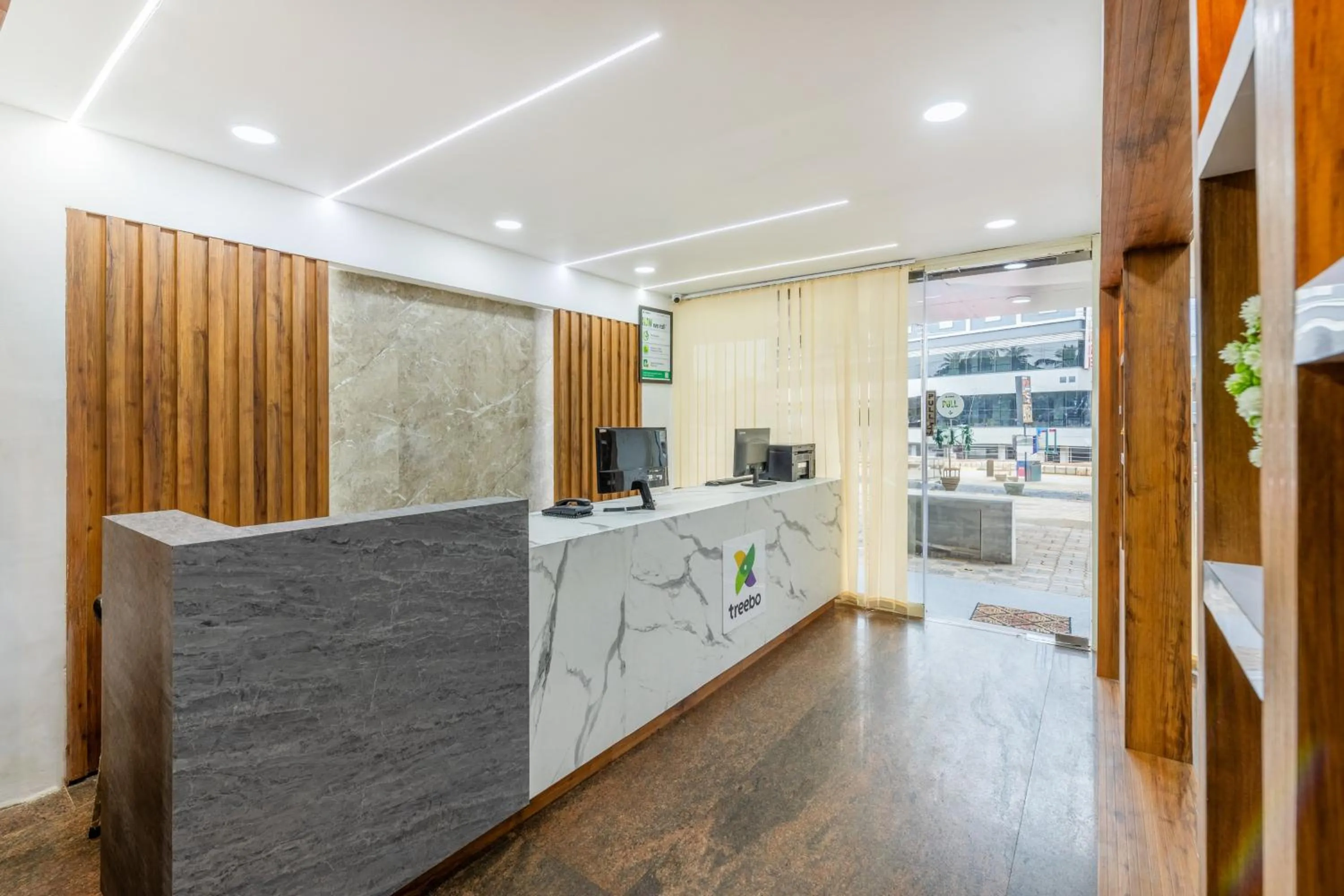 Lobby or reception in Treebo Sky City Grand, 5 Min From Mangalore Airport