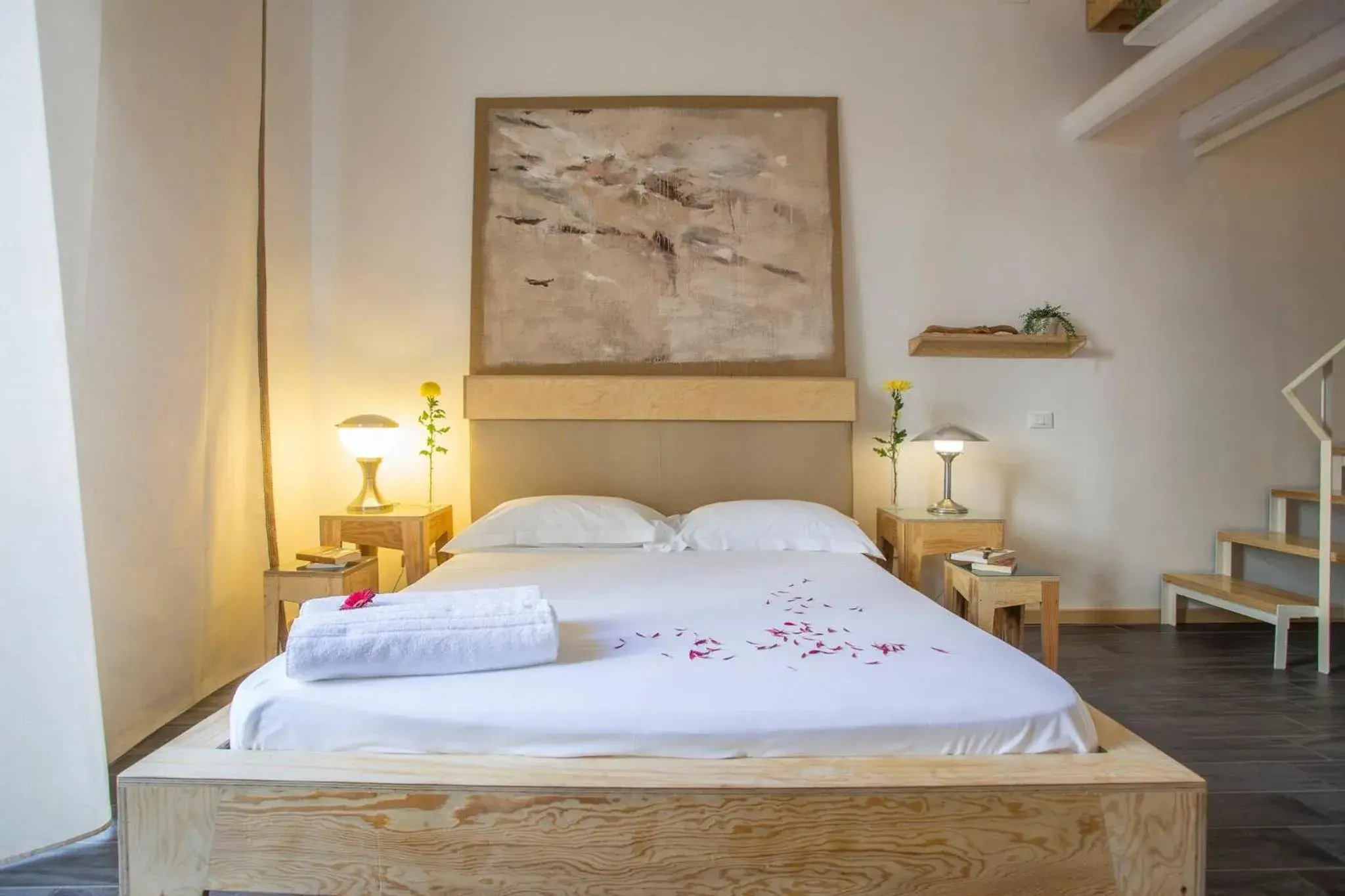 Bed in AQUAROOMS Suites Bed in AQUAROOMS Suites