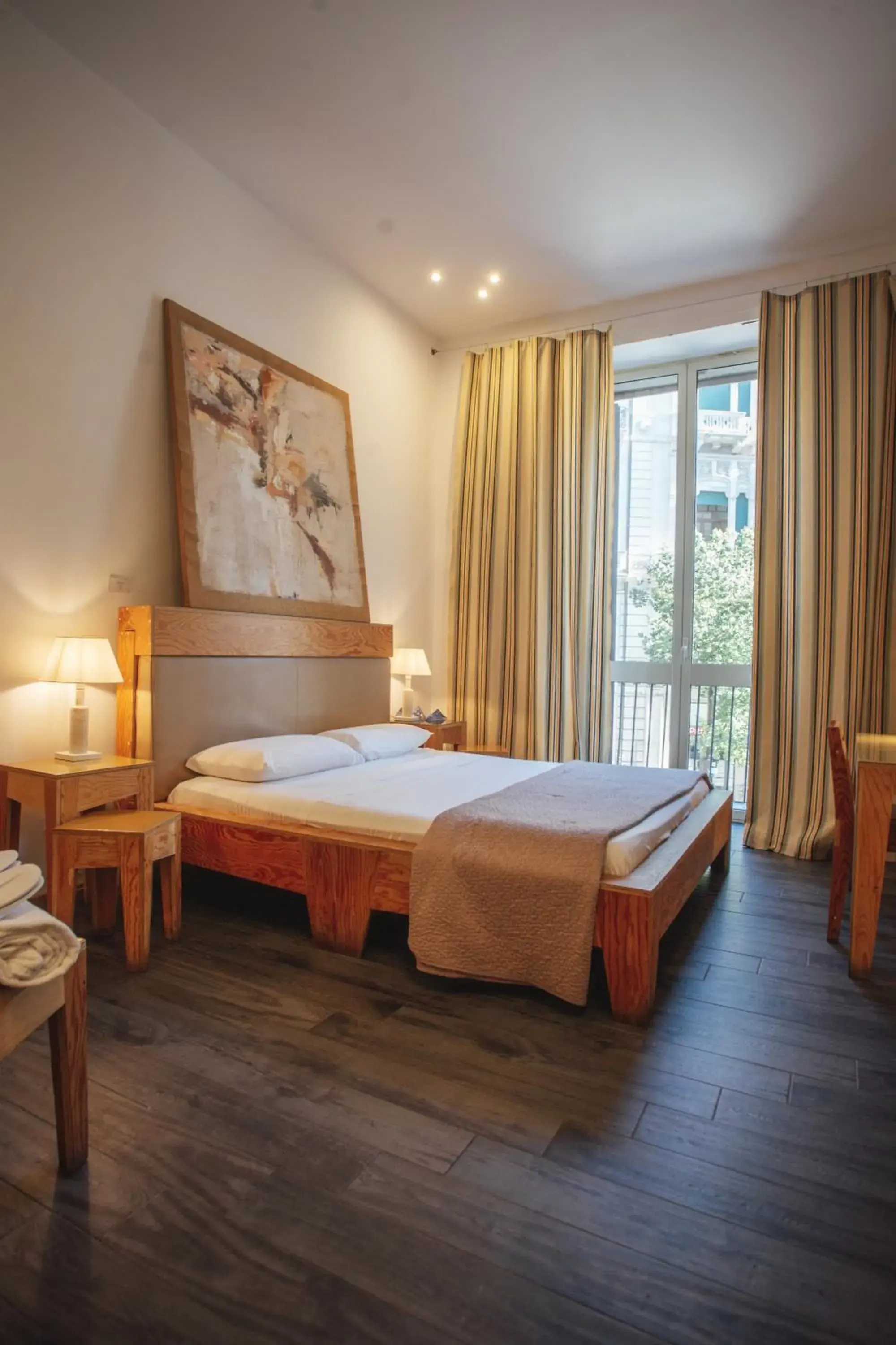 Bed in AQUAROOMS Suites Bed in AQUAROOMS Suites