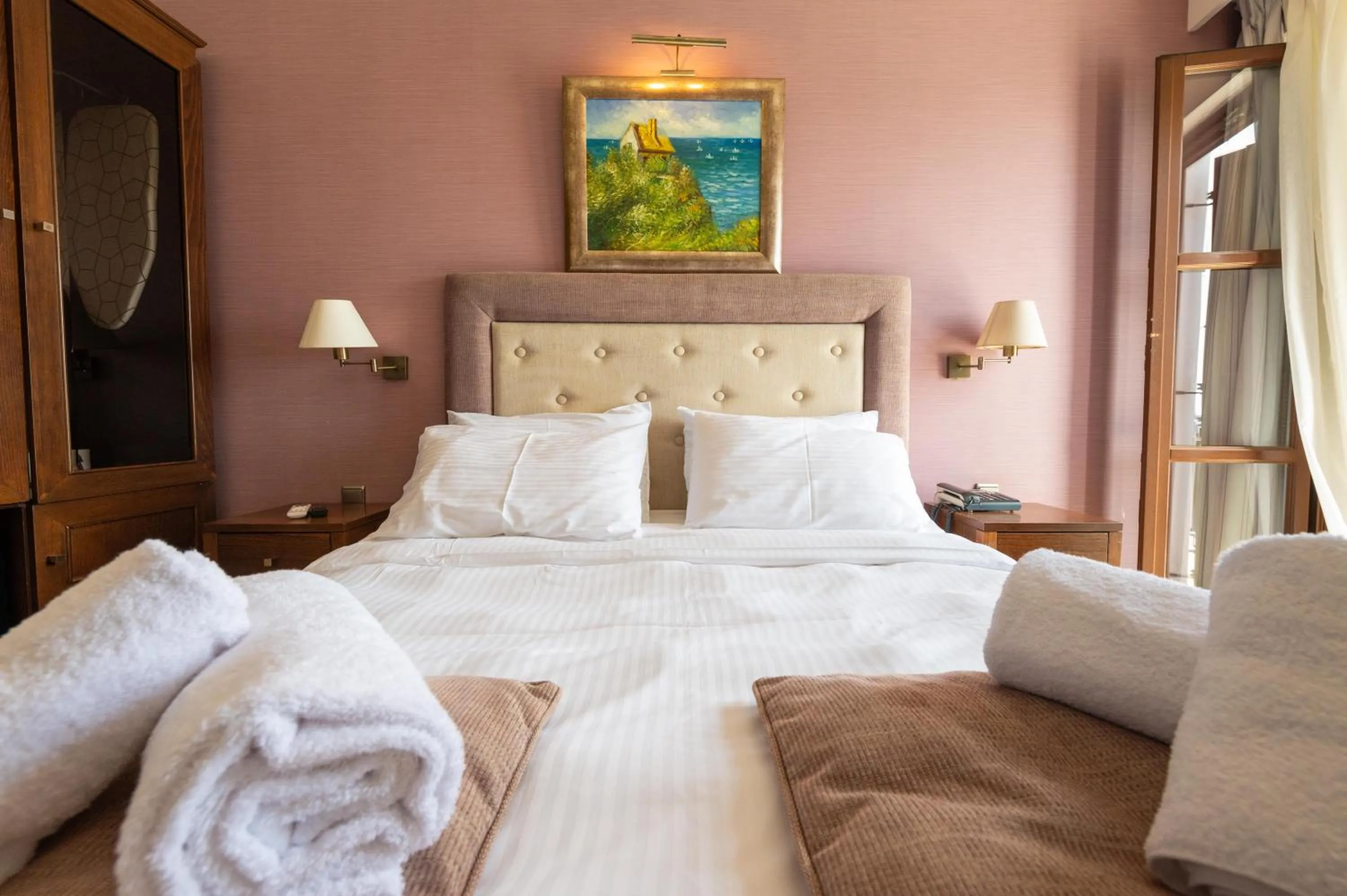 Bed in La Boheme Hotel