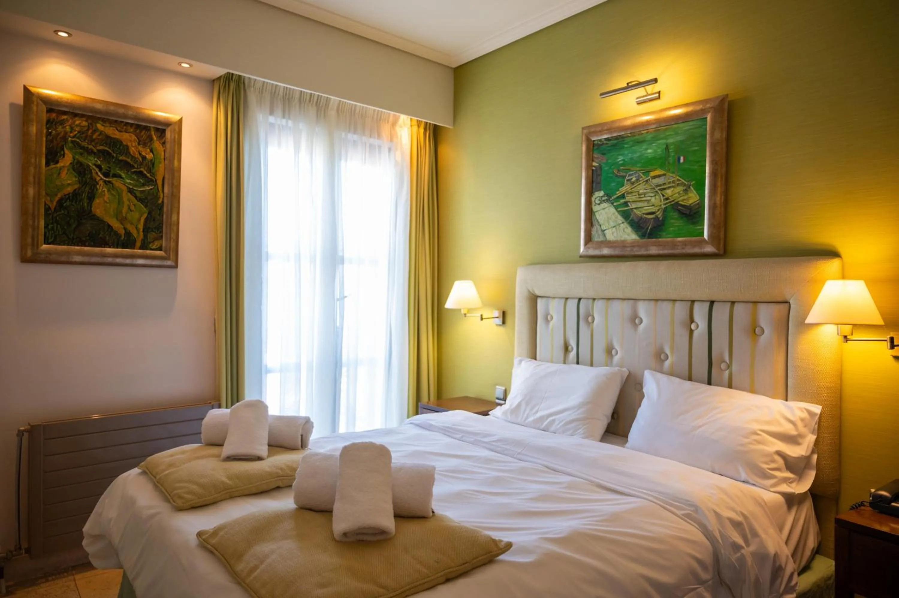 Bed in La Boheme Hotel