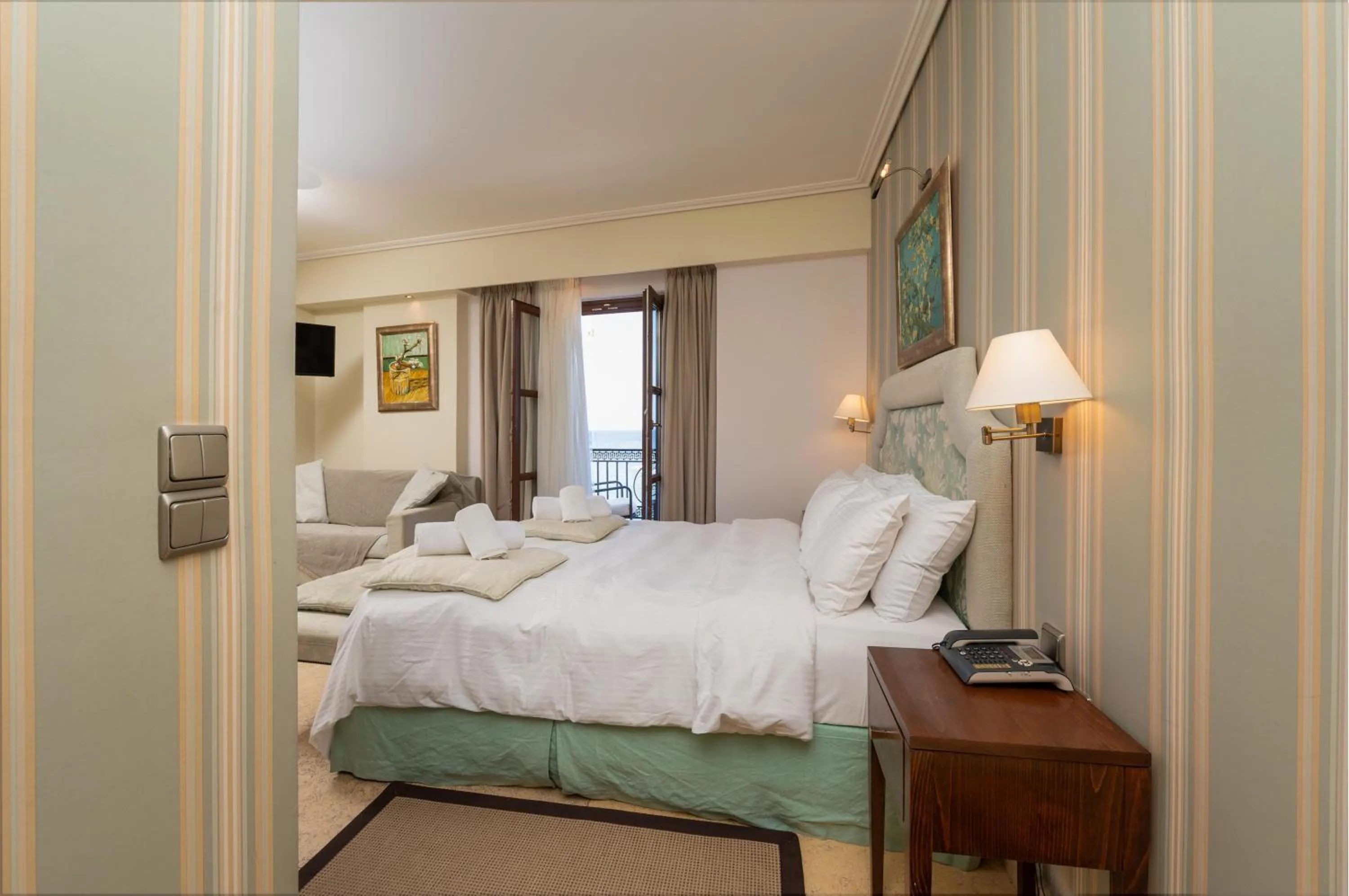 Bed in La Boheme Hotel