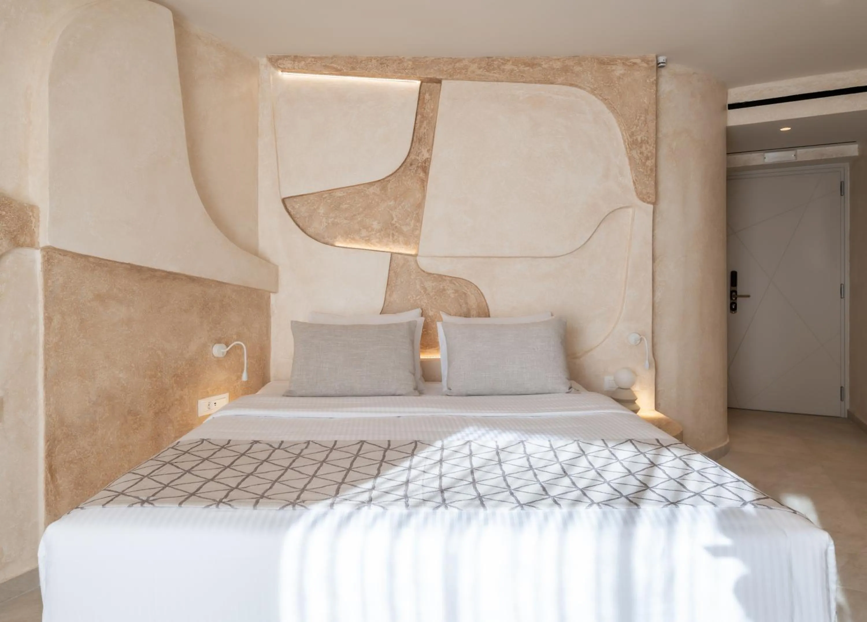 Bed in Heyday Luxury Suites