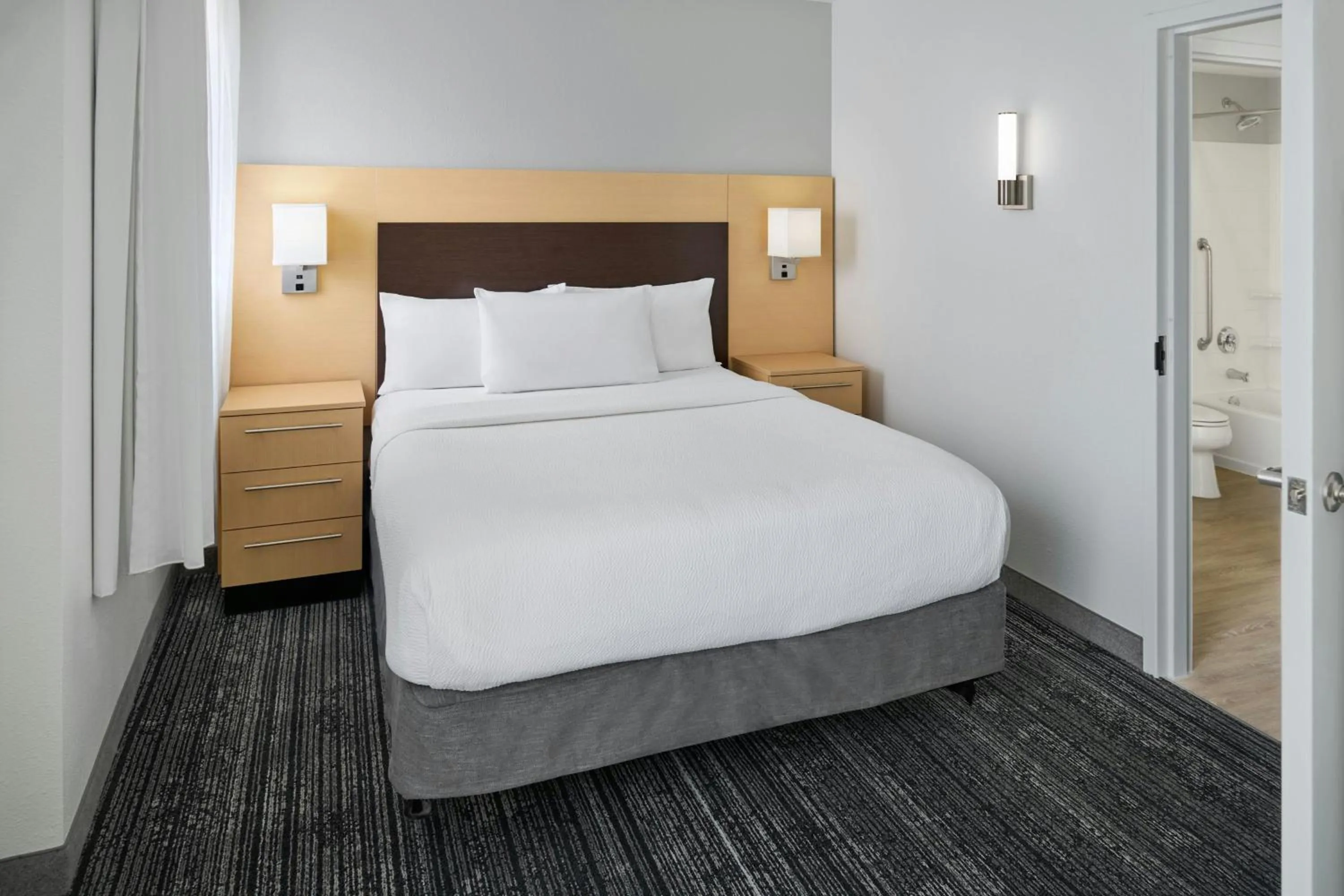 Bedroom, Bed in TownePlace Suites by Marriott Lawrence Downtown