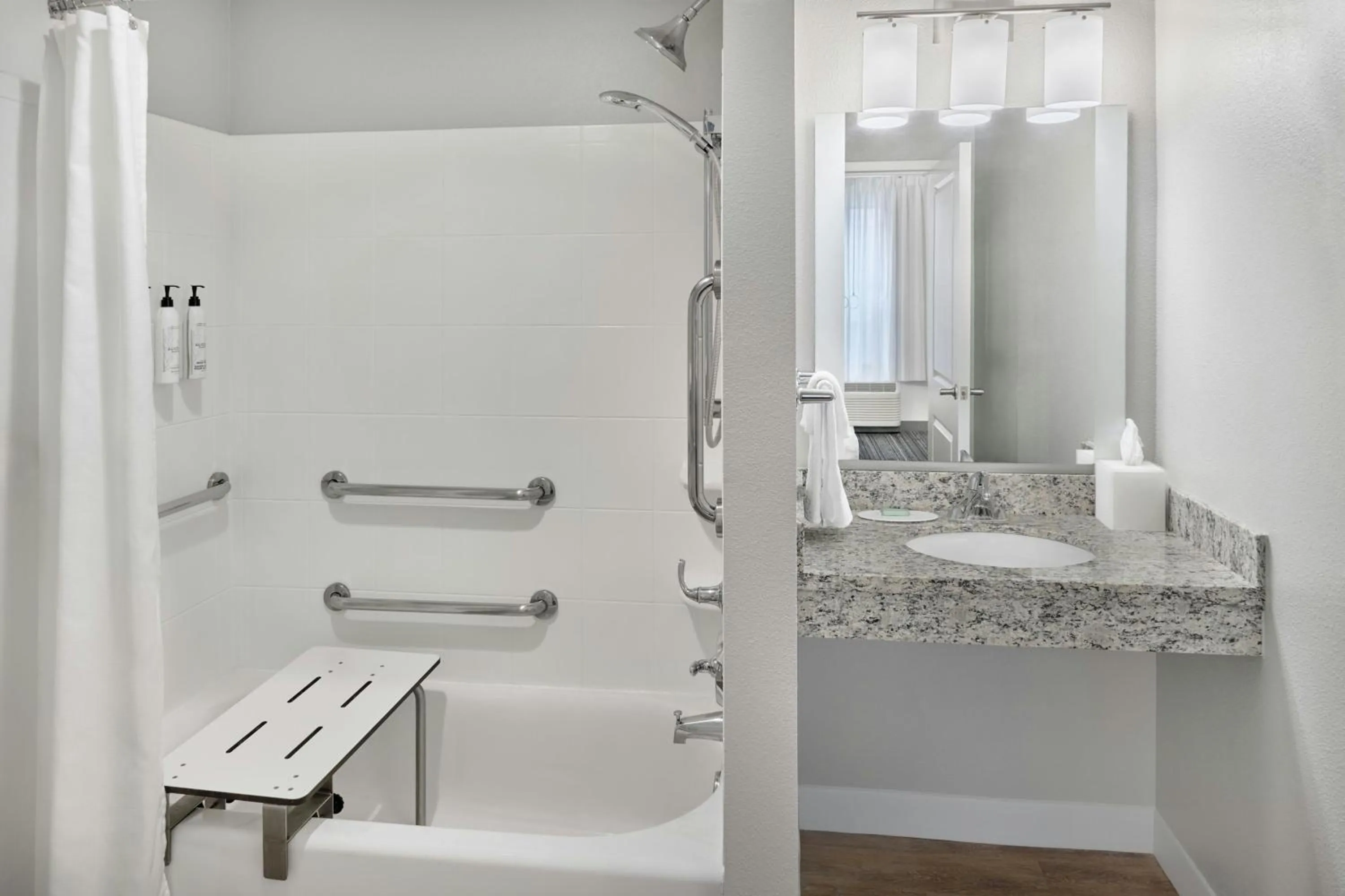 Bathroom in TownePlace Suites by Marriott Lawrence Downtown