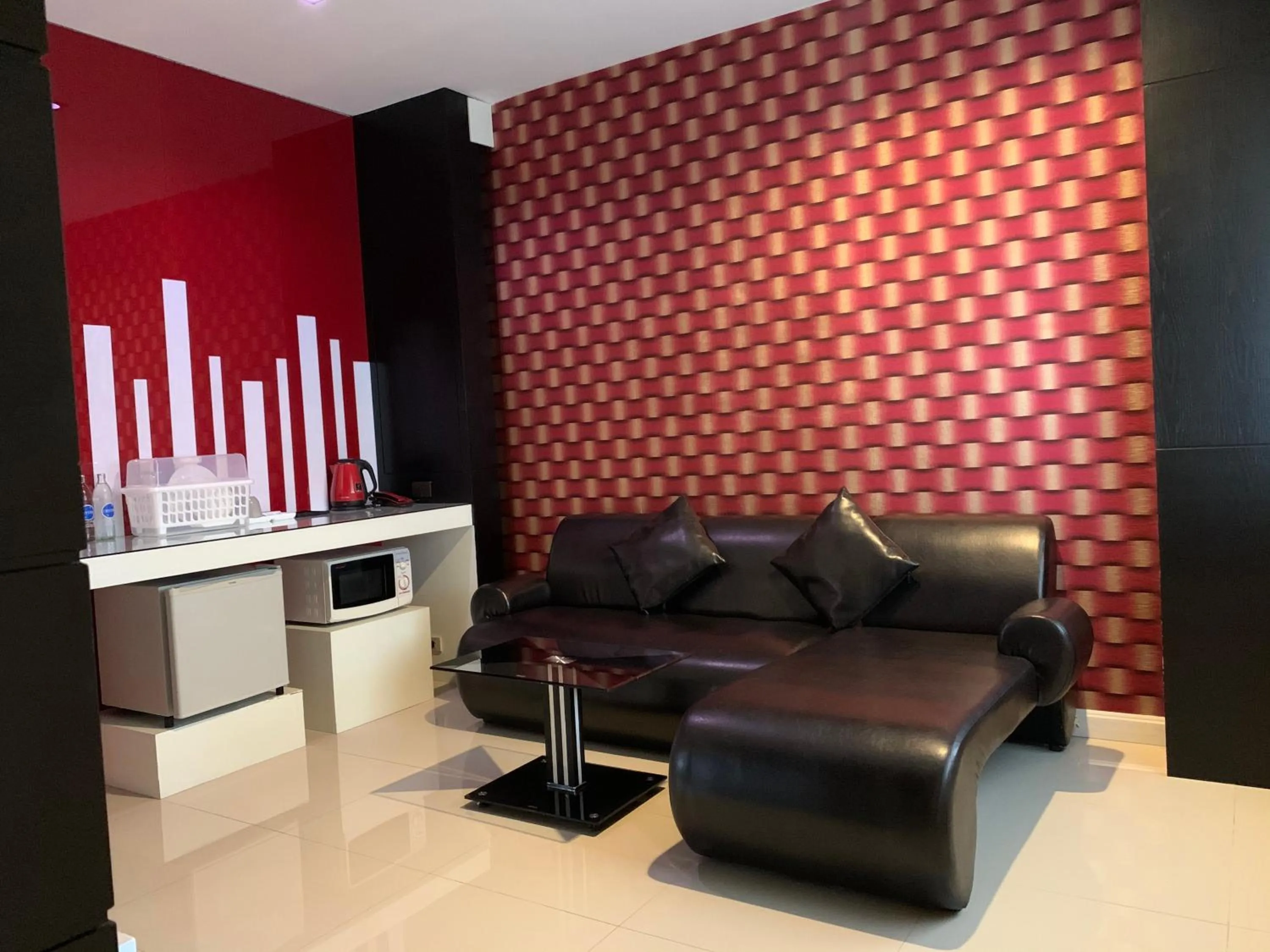 Living room in Homey Dormy Chiangrai