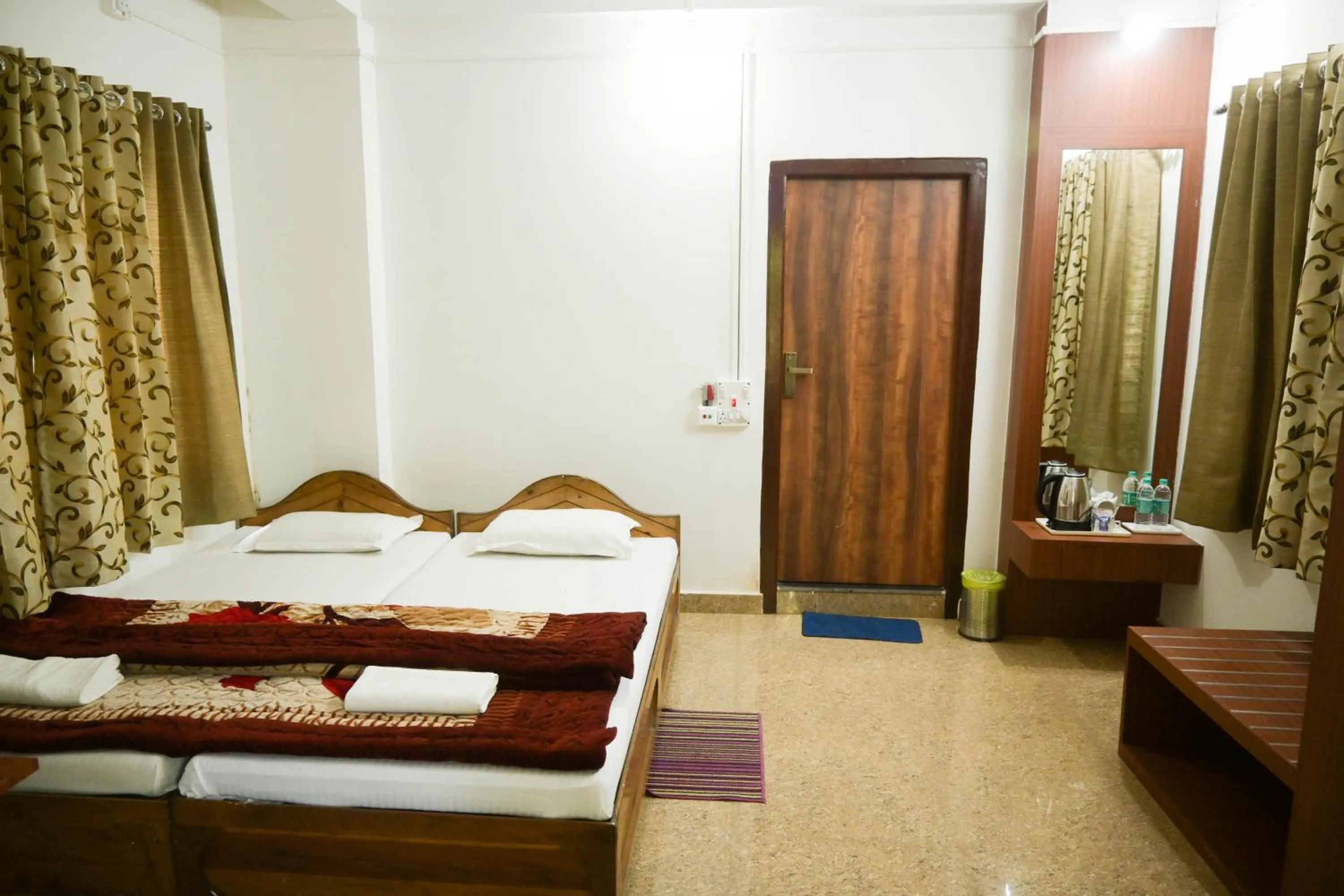 Bed in Aranya Jungle Resorts