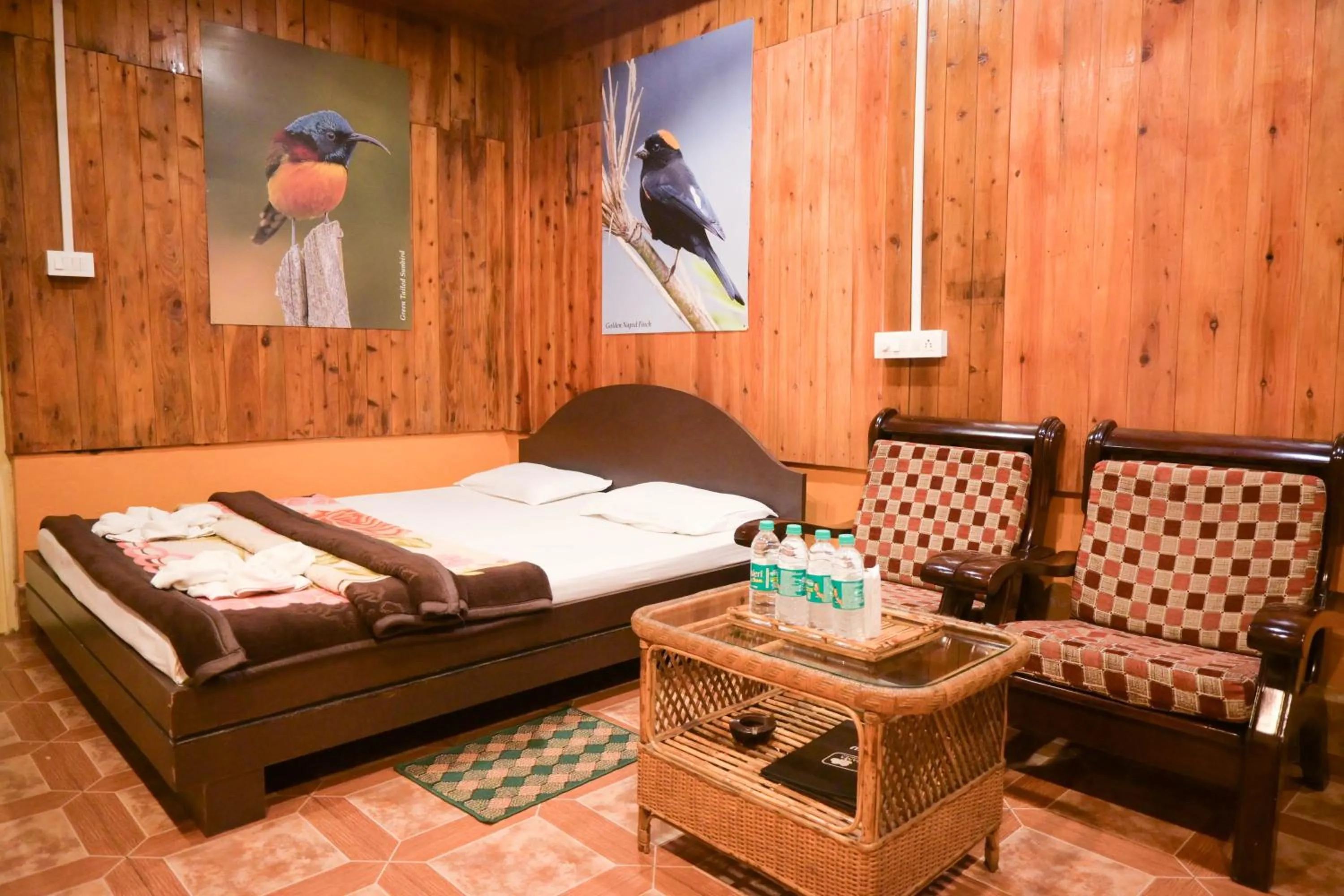 Bed in Aranya Jungle Resorts
