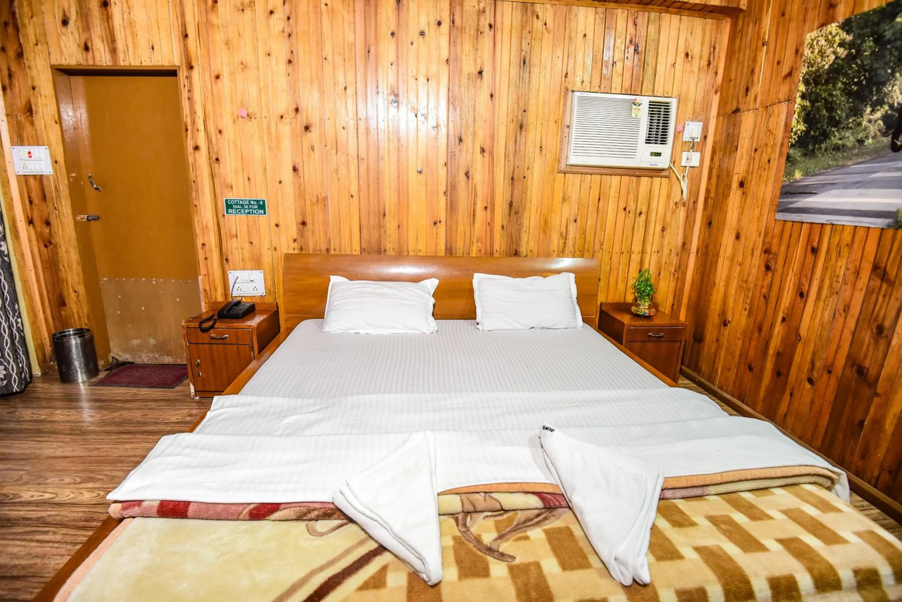 Bed in Aranya Jungle Resorts