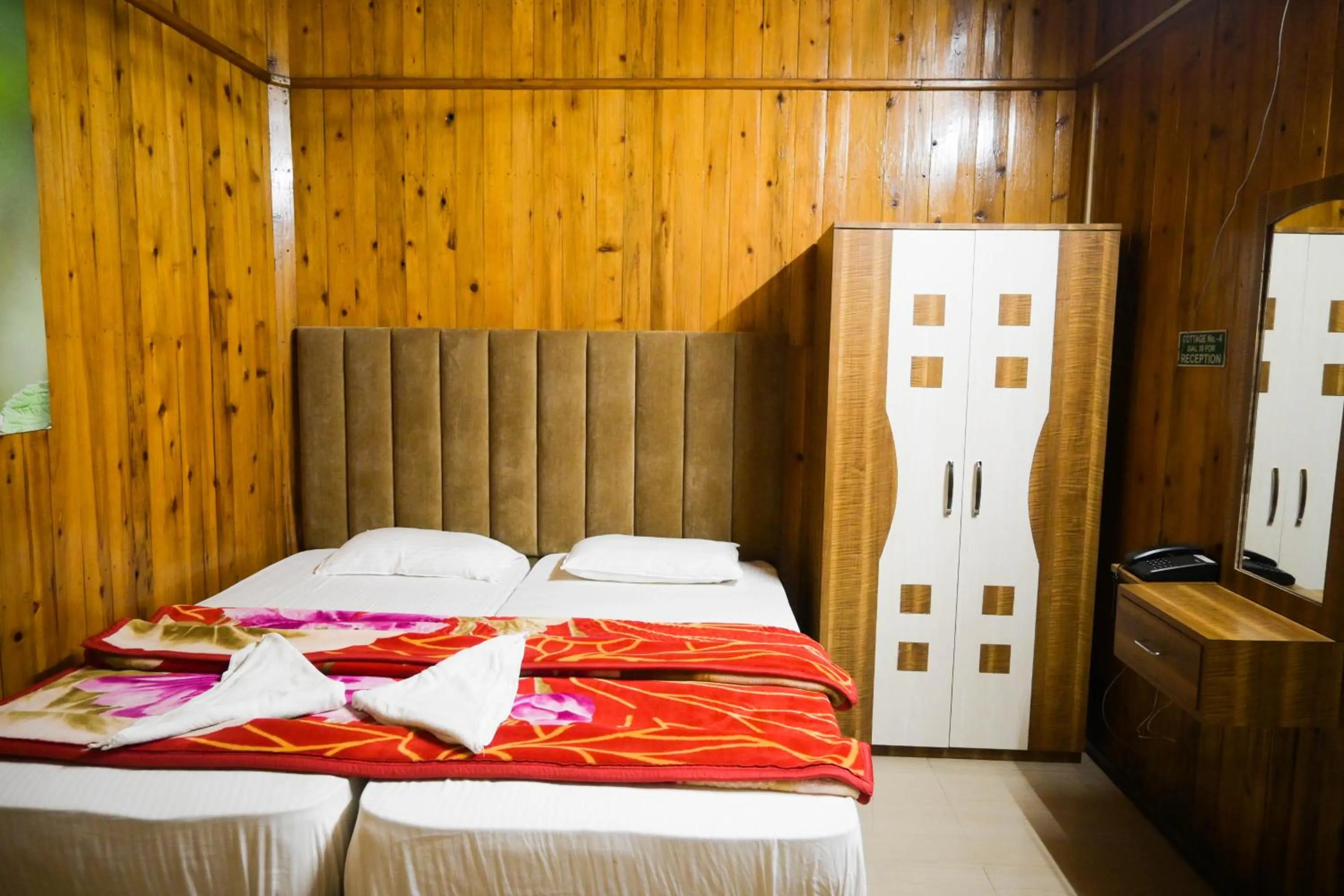 Property building, Bed in Aranya Jungle Resorts