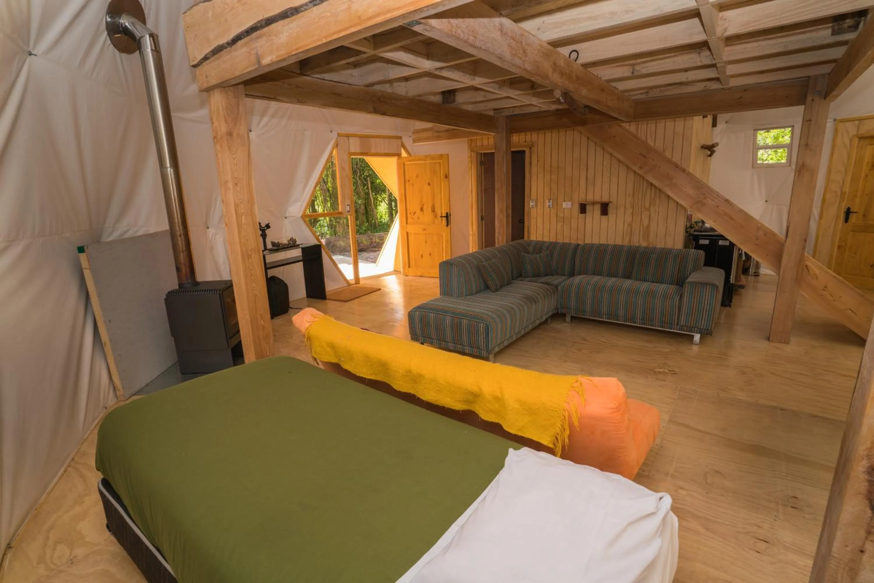 Living room, Bed in Cabañas Ensenada Bosque Nativo