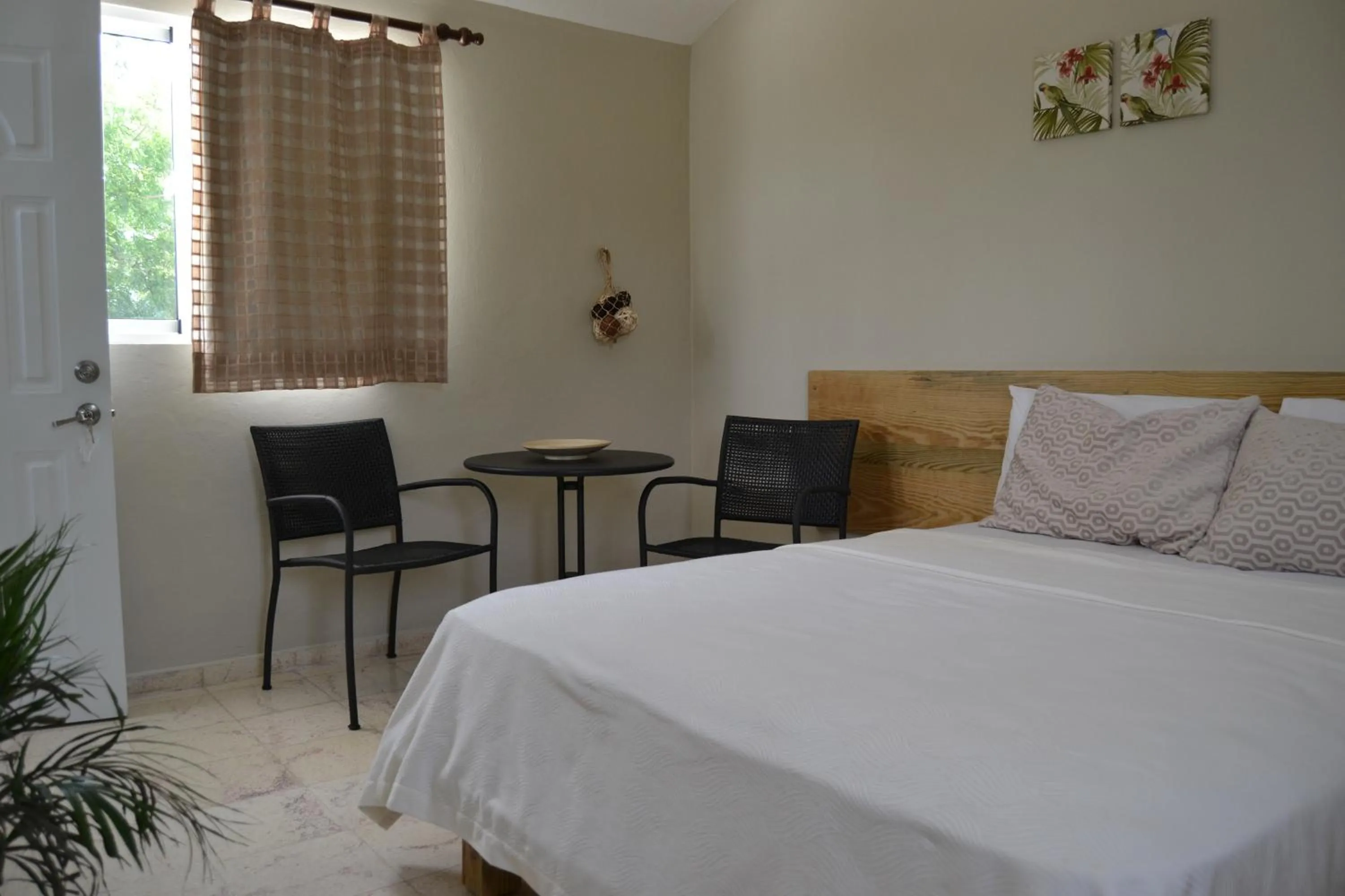 Photo of the whole room, Bed in Paradise Island Beach Resort