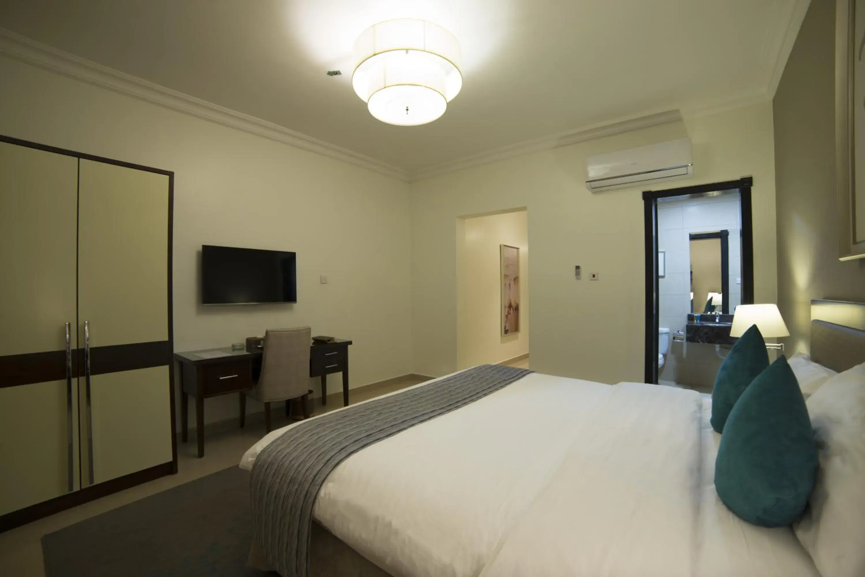 Bed in Tulip Inn - Taskeen Served Apartment Bed in Tulip Inn - Taskeen Served Apartment