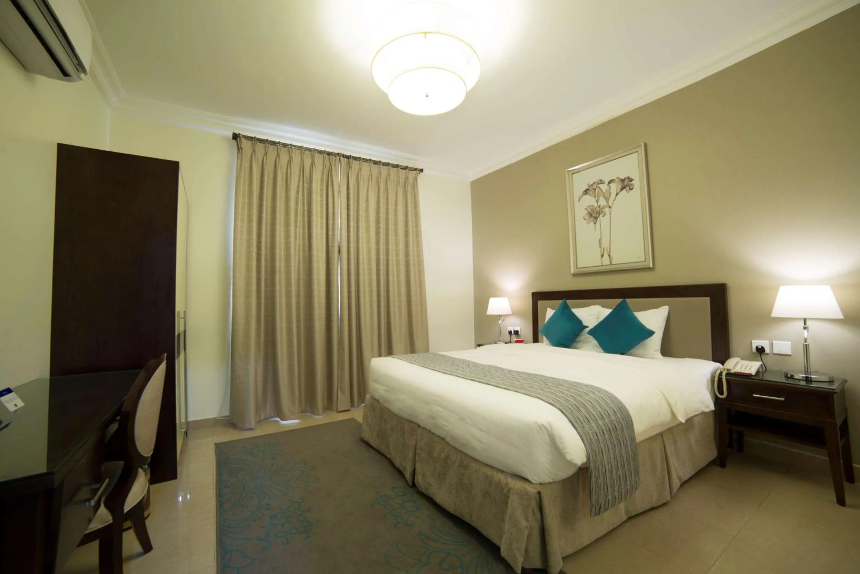 Photo of the whole room, Bed in Taskeen Inn, Formerly Tulip Inn