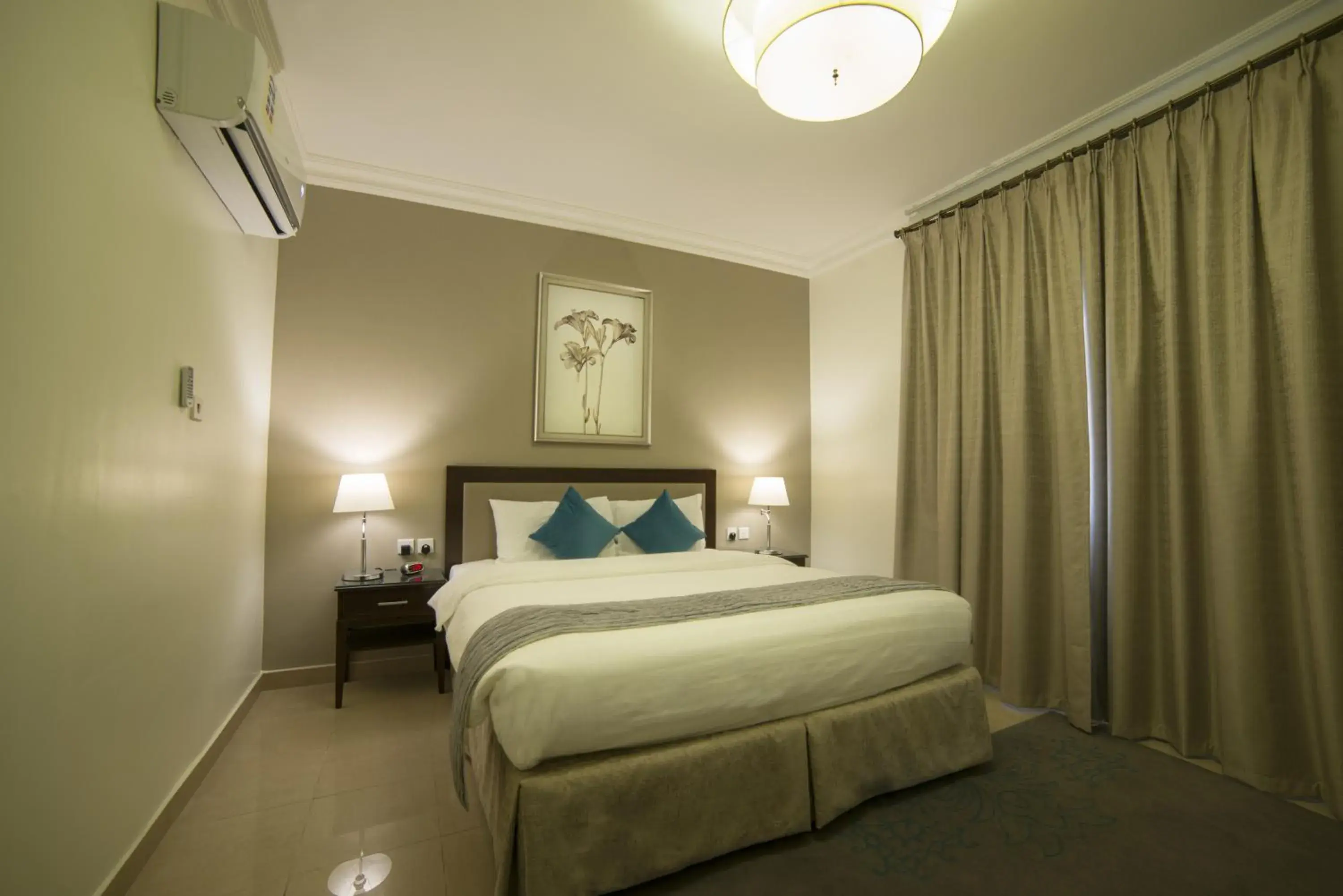 Bed in Tulip Inn - Taskeen Served Apartment Bed in Tulip Inn - Taskeen Served Apartment