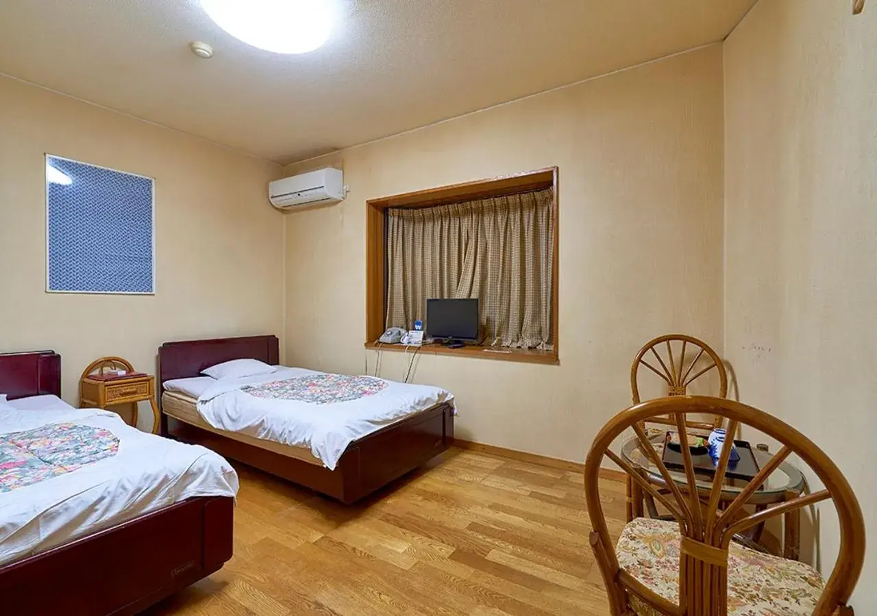 Bed in Shinwaka Lodge Bed in Shinwaka Lodge