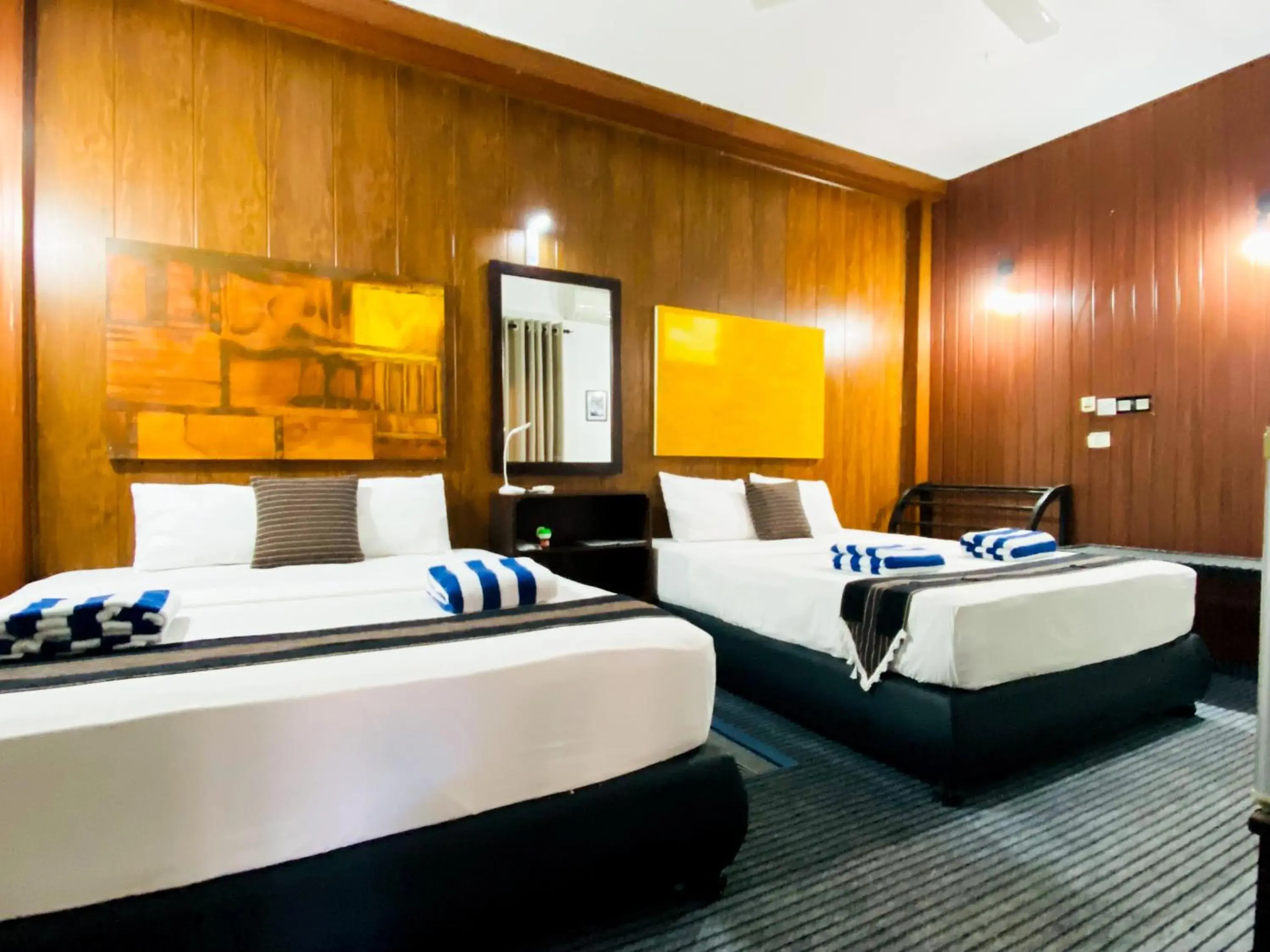 Deluxe Family Room in Coco Palm Villa and Cabanas Deluxe Family Room in Coco Palm Villa and Cabanas