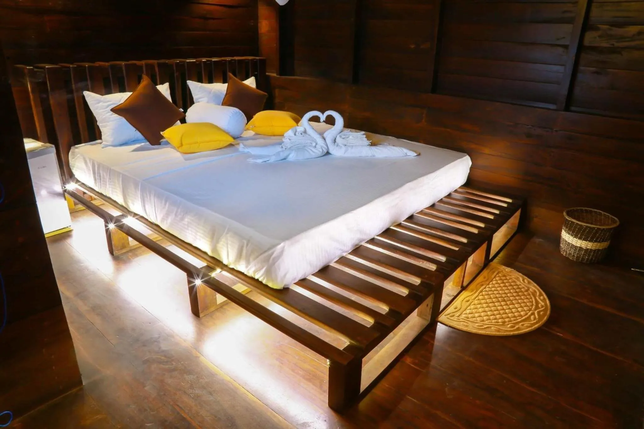 Bed in Coco Palm Villa and Cabanas