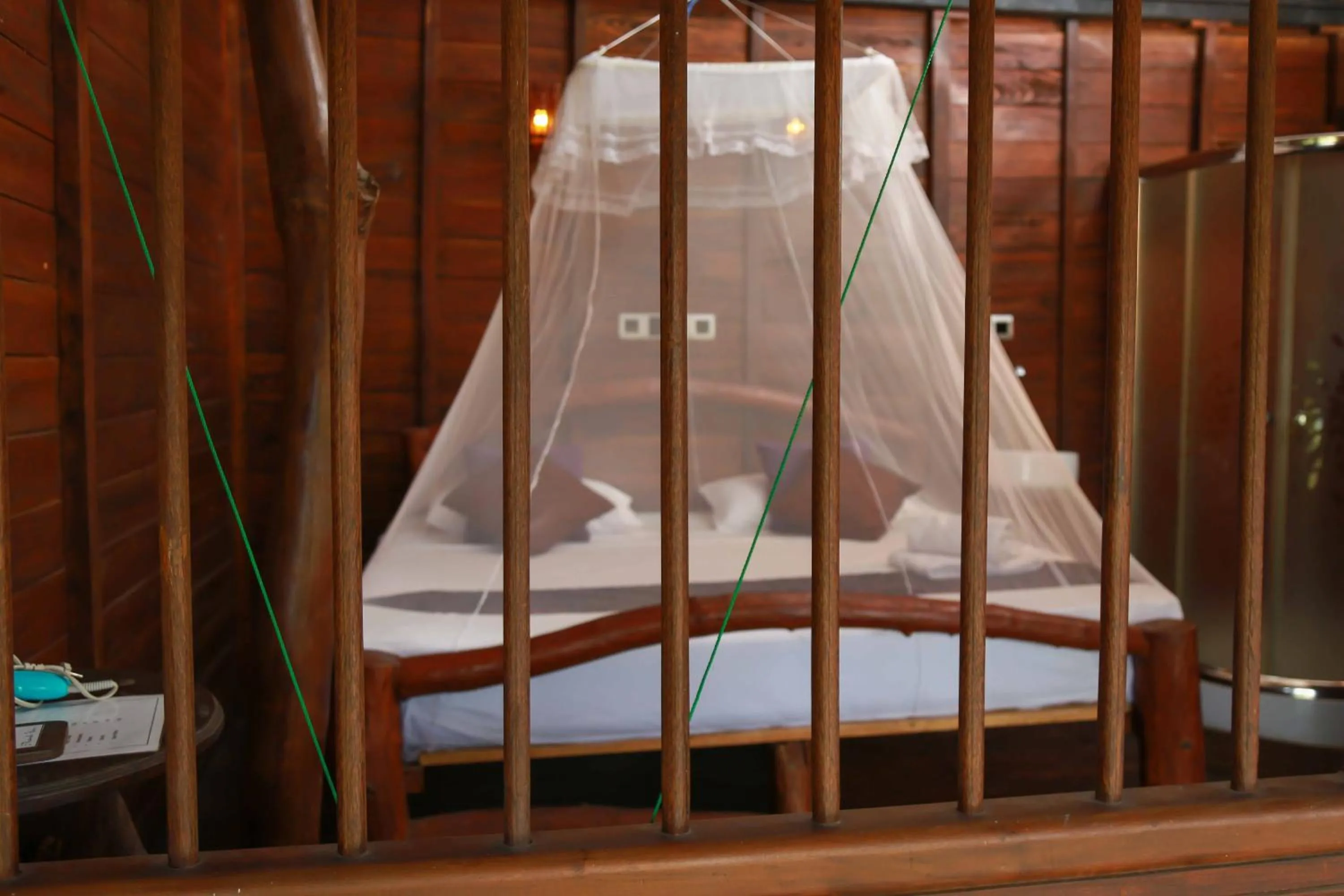 Bed in Coco Palm Villa and Cabanas