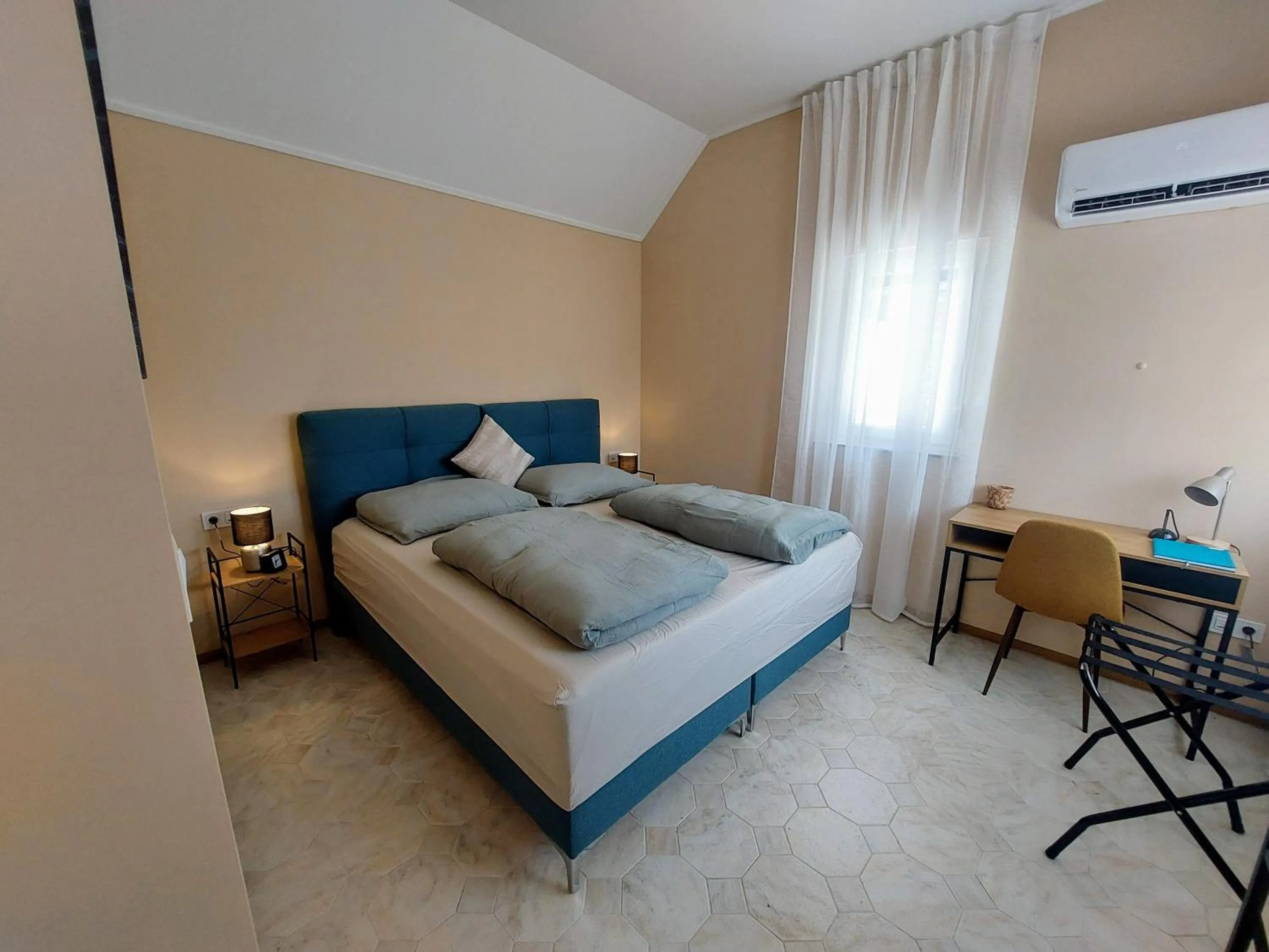 Photo of the whole room, Bed in Bük City Apartments - Bük - Bükfurdő