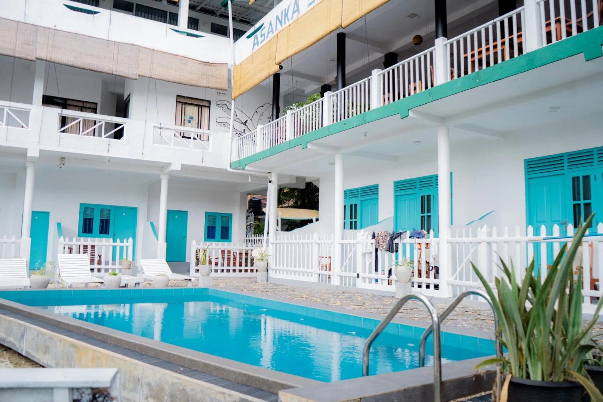 Property building in Asanka Surf House & Restaurant with pool